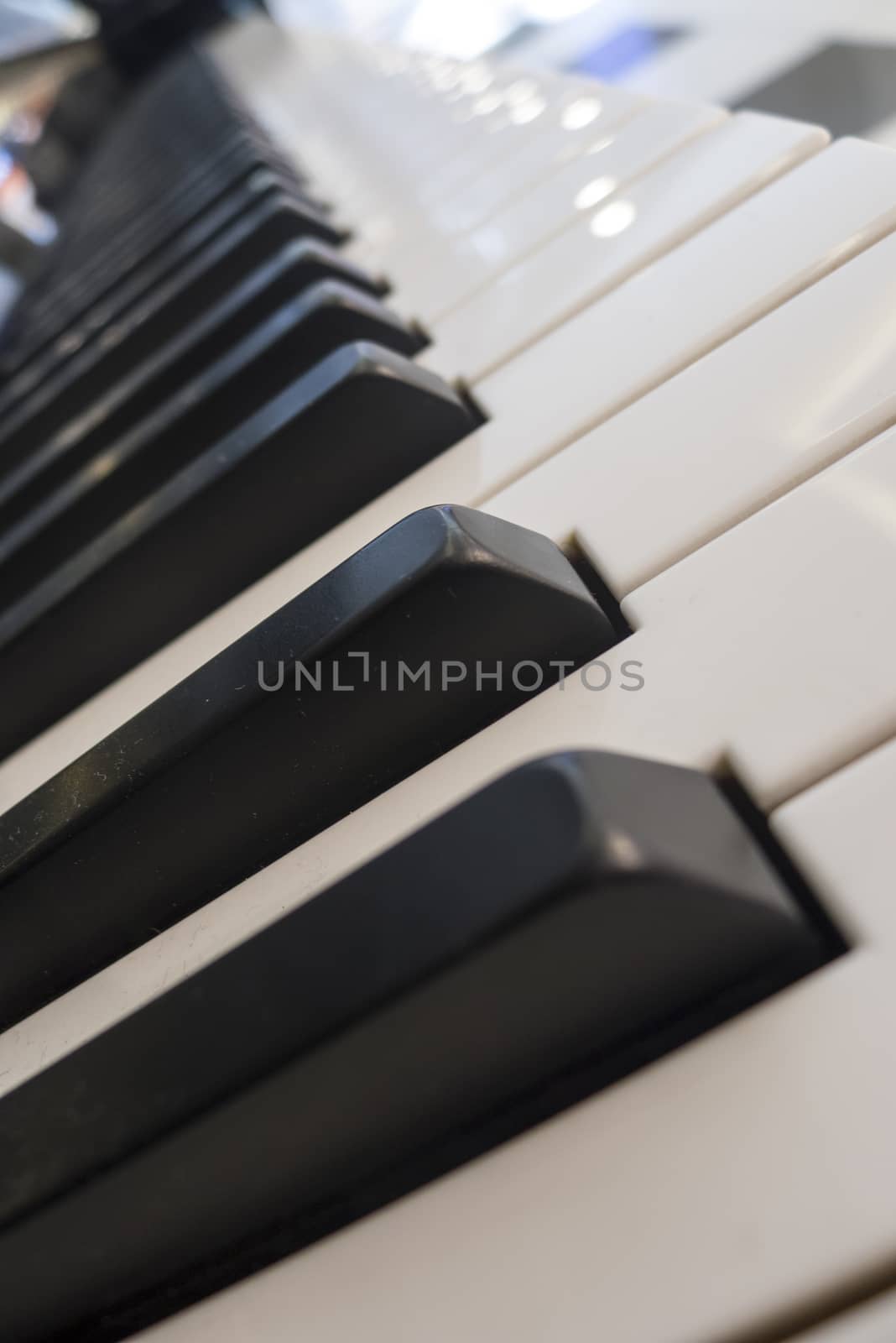 Close up of piano musical instrument keys.