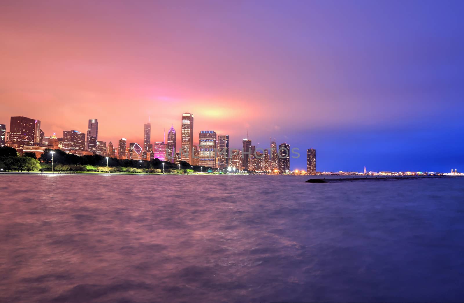 The Chicago skyline at night after a storm across Lake Michigan.