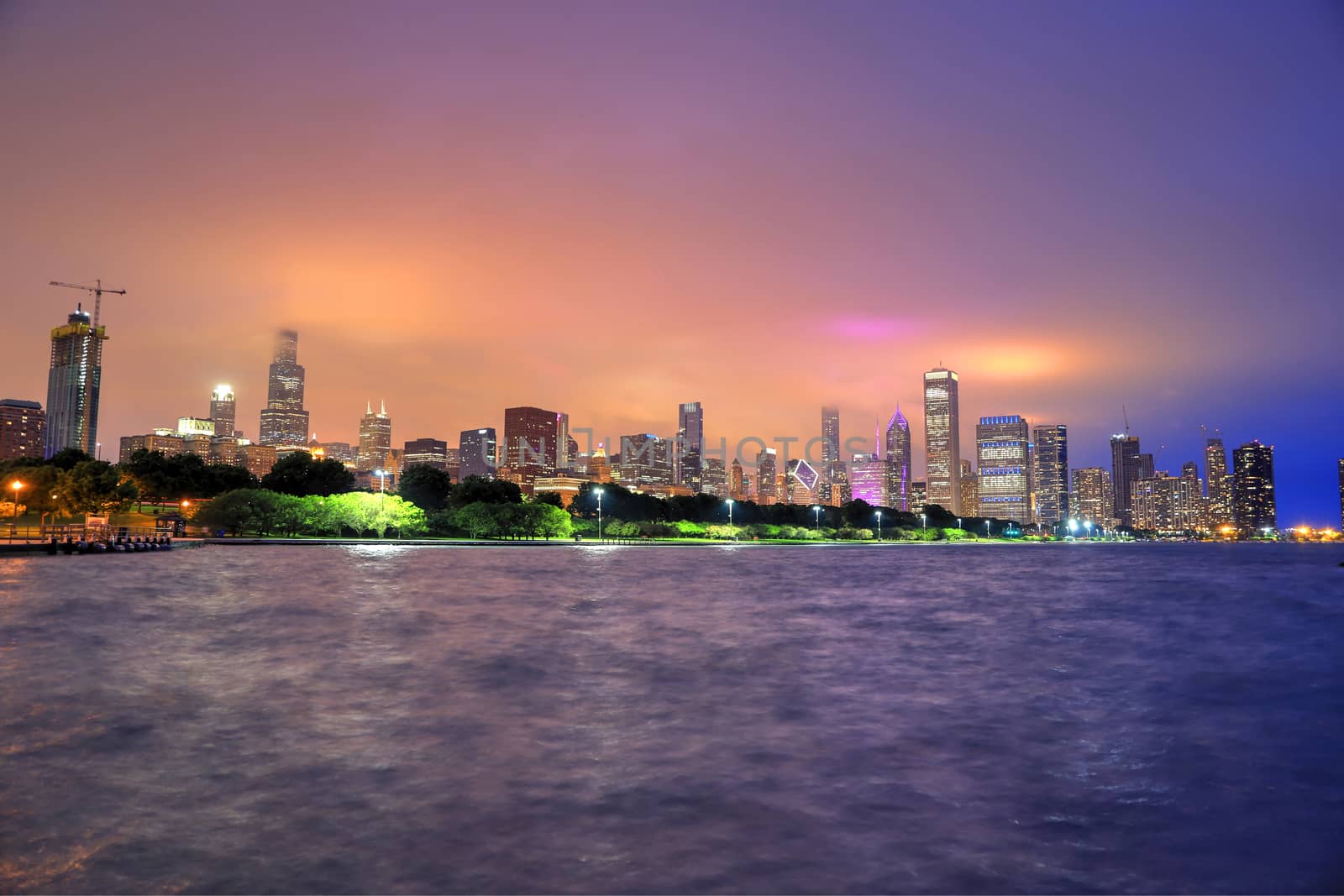 The Chicago skyline at night after a storm across Lake Michigan.