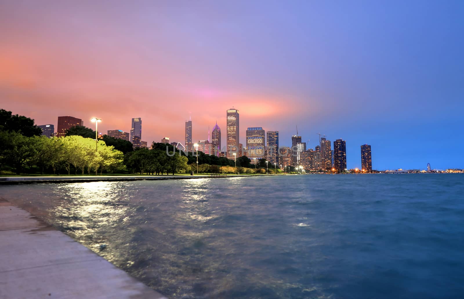 The Chicago skyline at night after a storm across Lake Michigan.