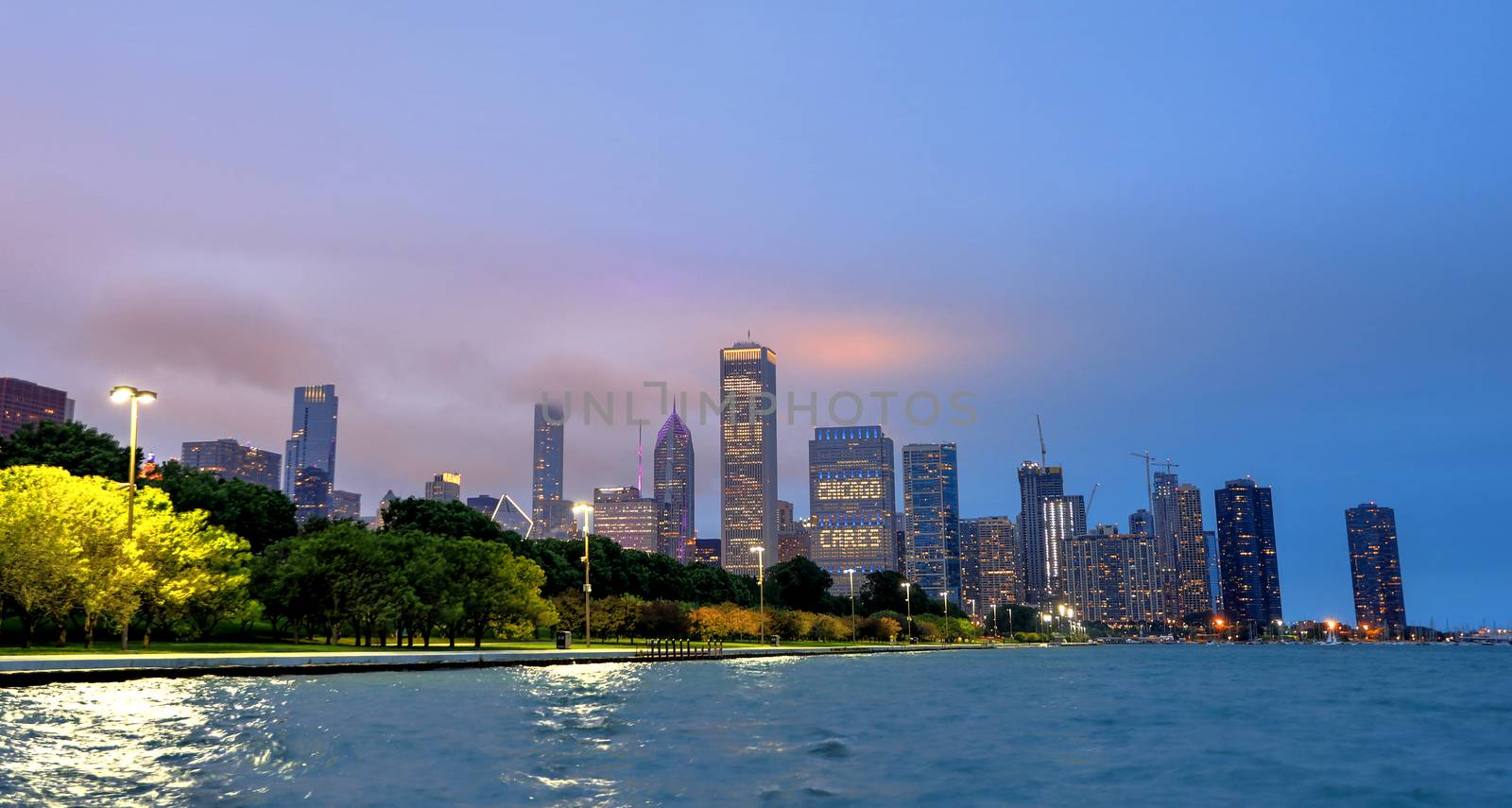 The Chicago skyline at night after a storm across Lake Michigan.