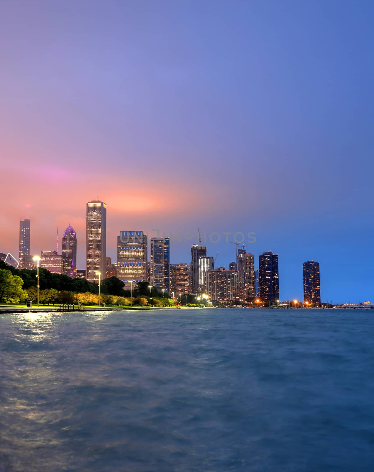 The Chicago skyline at night after a storm across Lake Michigan.