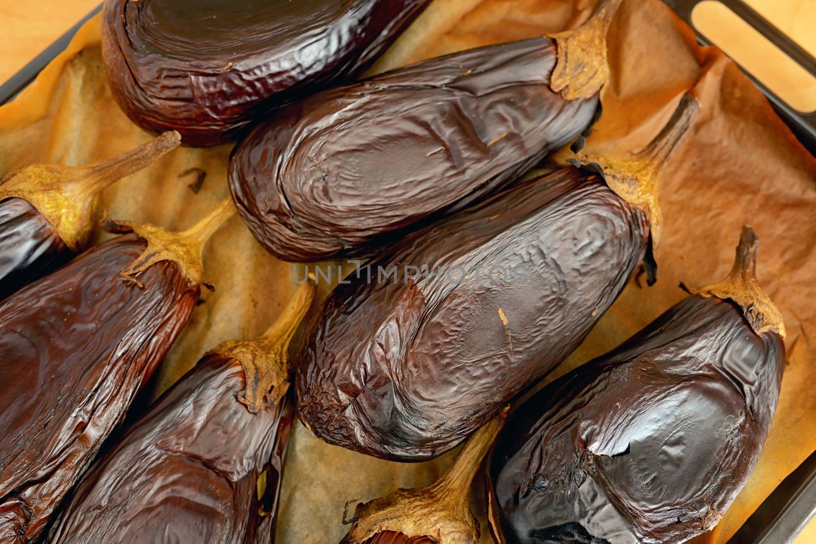 Roasted eggplants in oven tray by mady70