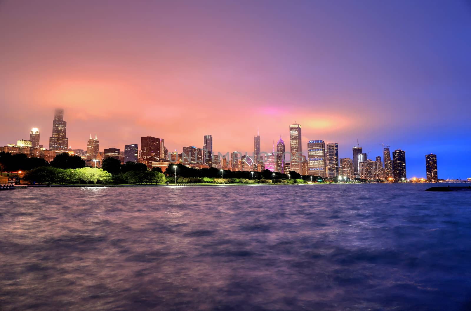 Chicago, Illinois, USA - June 22, 2018 - The Chicago skyline at night after a storm across Lake Michigan.