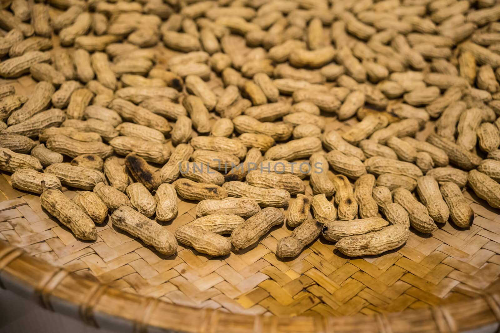 Fried and Dried Peanuts in a Bamboo Tray