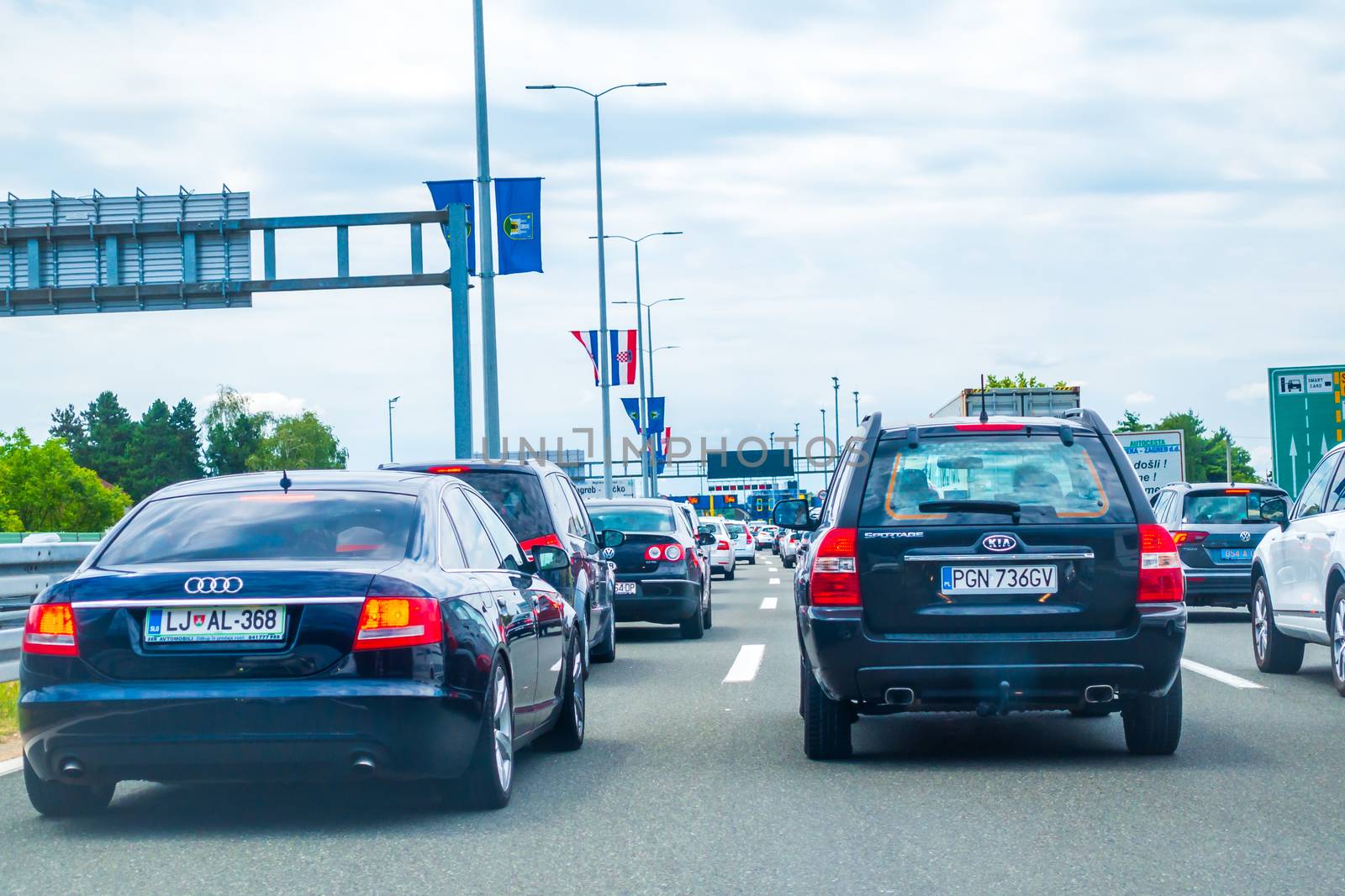 Highway A1 near Zagreb, Croatia, July 1 2018: Highway toll station Lucko in Zagreb, Croatia during holiday season is reason for long congestions on main Croatian highway in summer