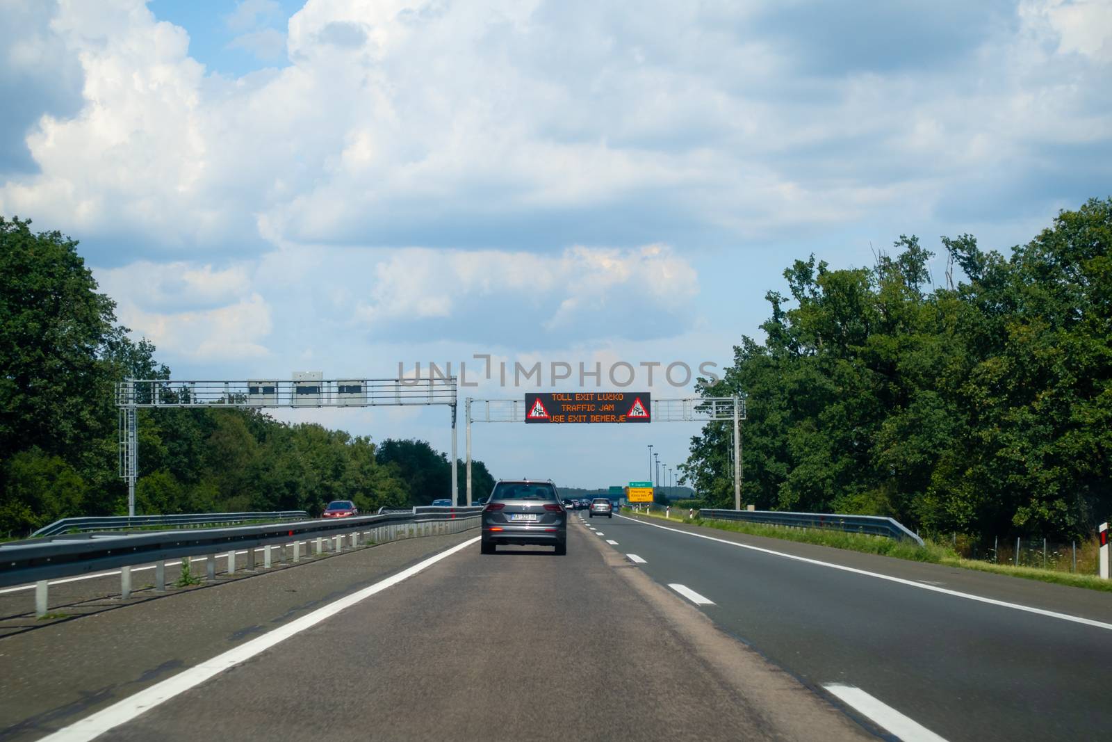 Highway in Croatia near Zagreb with congestion warning on display by asafaric
