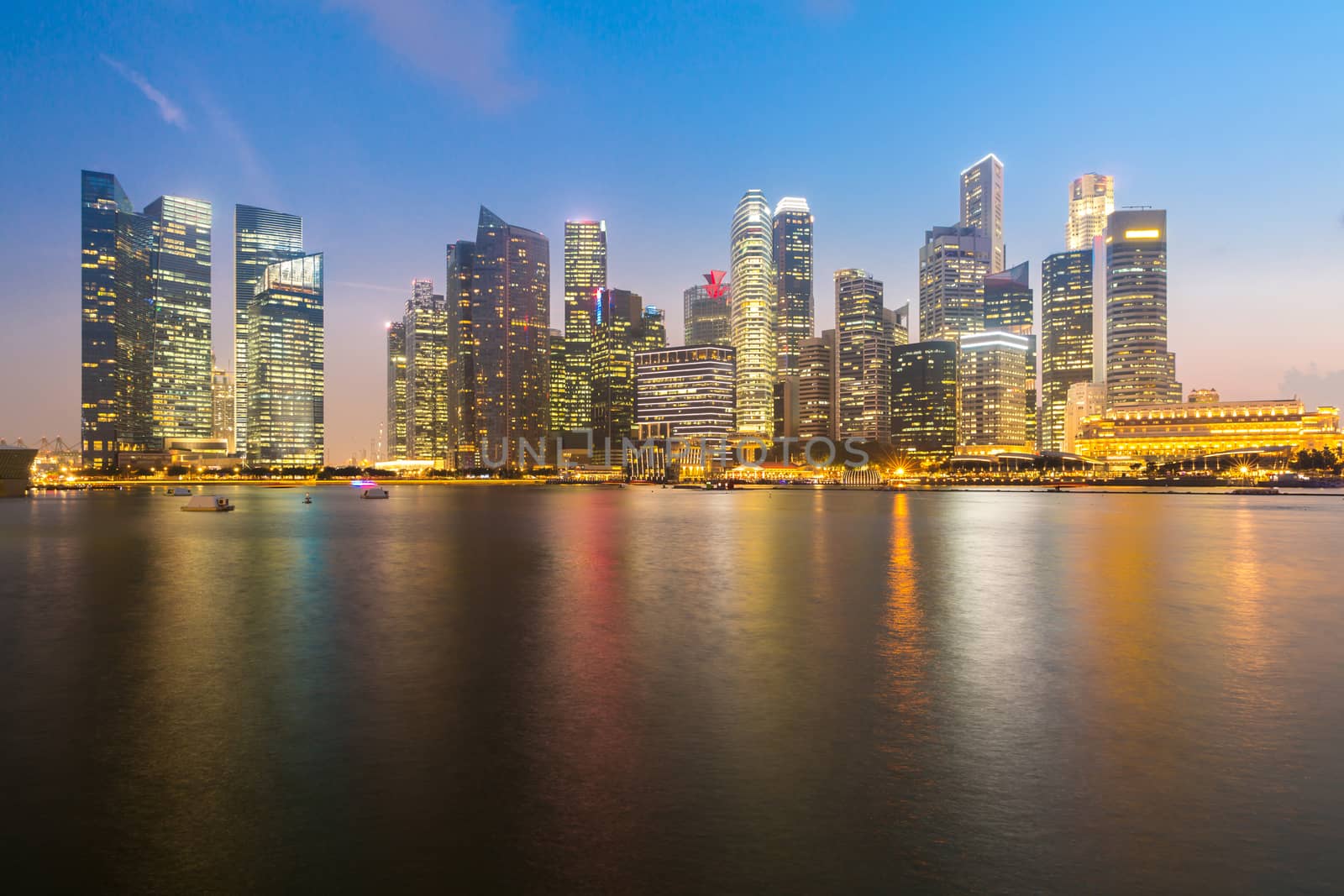 Singapore downtown cityscape with modern skyline and  city skyscraper sunset at Marina Bay