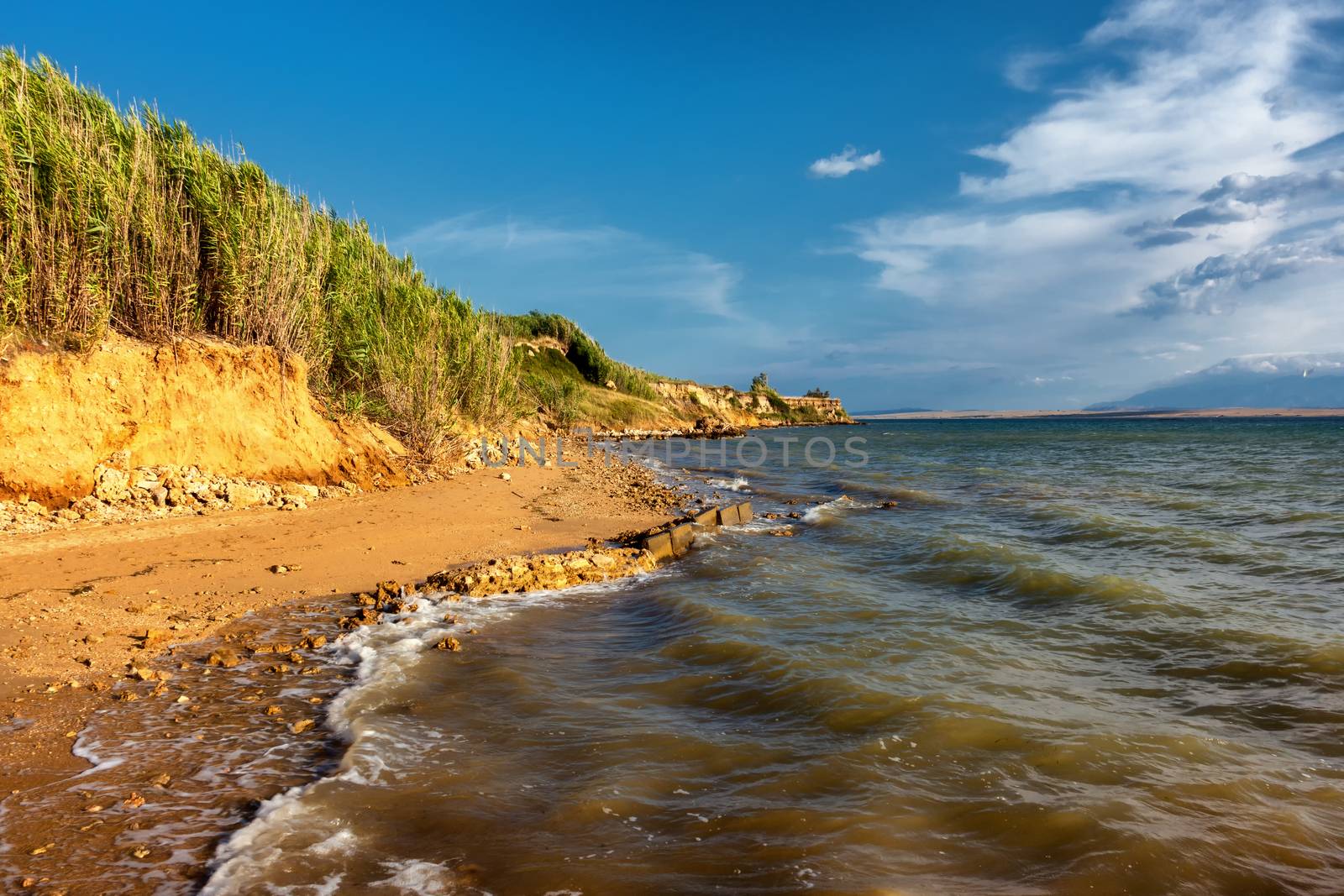 Famous Sabunike Beach on Privlaka peninsula near Nin, Zadar county, Croatia. Rare sand beach in the Adriatic sea, due favorable wind the beach is popular for surfing and kitesurfing