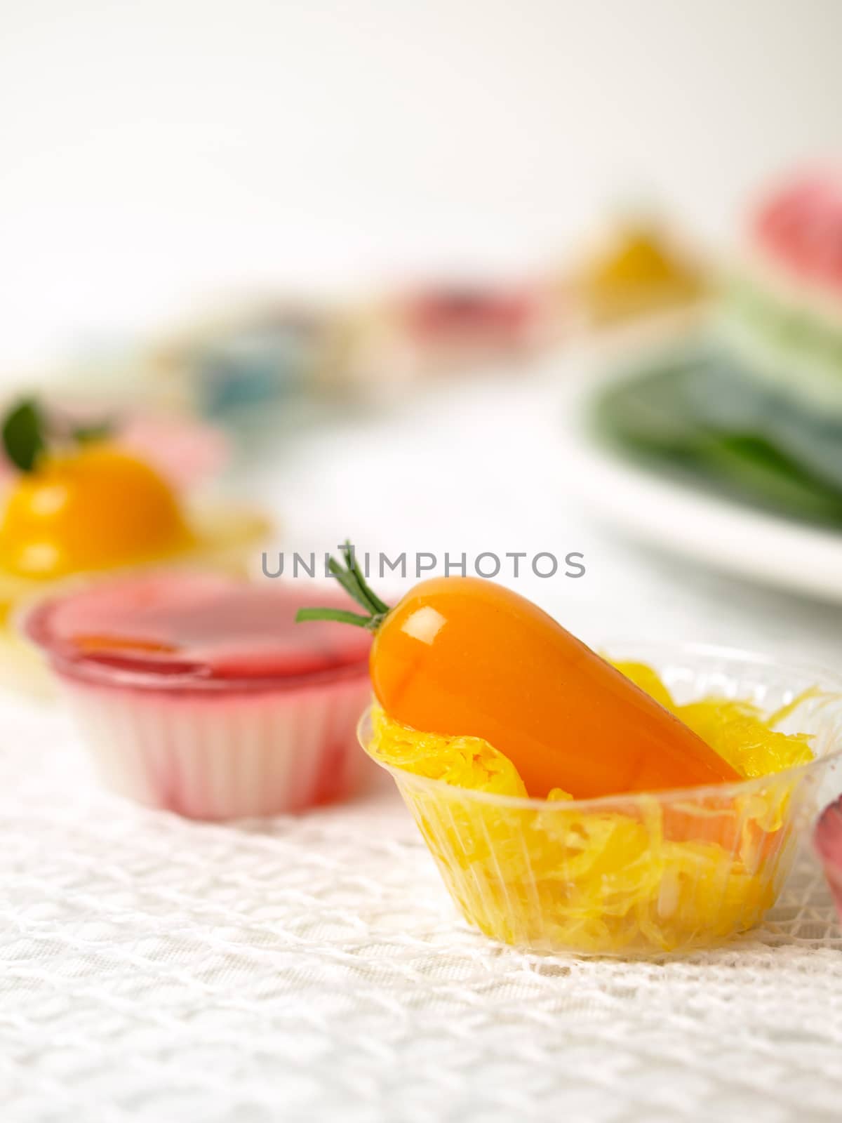 Colorful Coconut jelly Thai dessert with Look Choup , the dessert plated balls