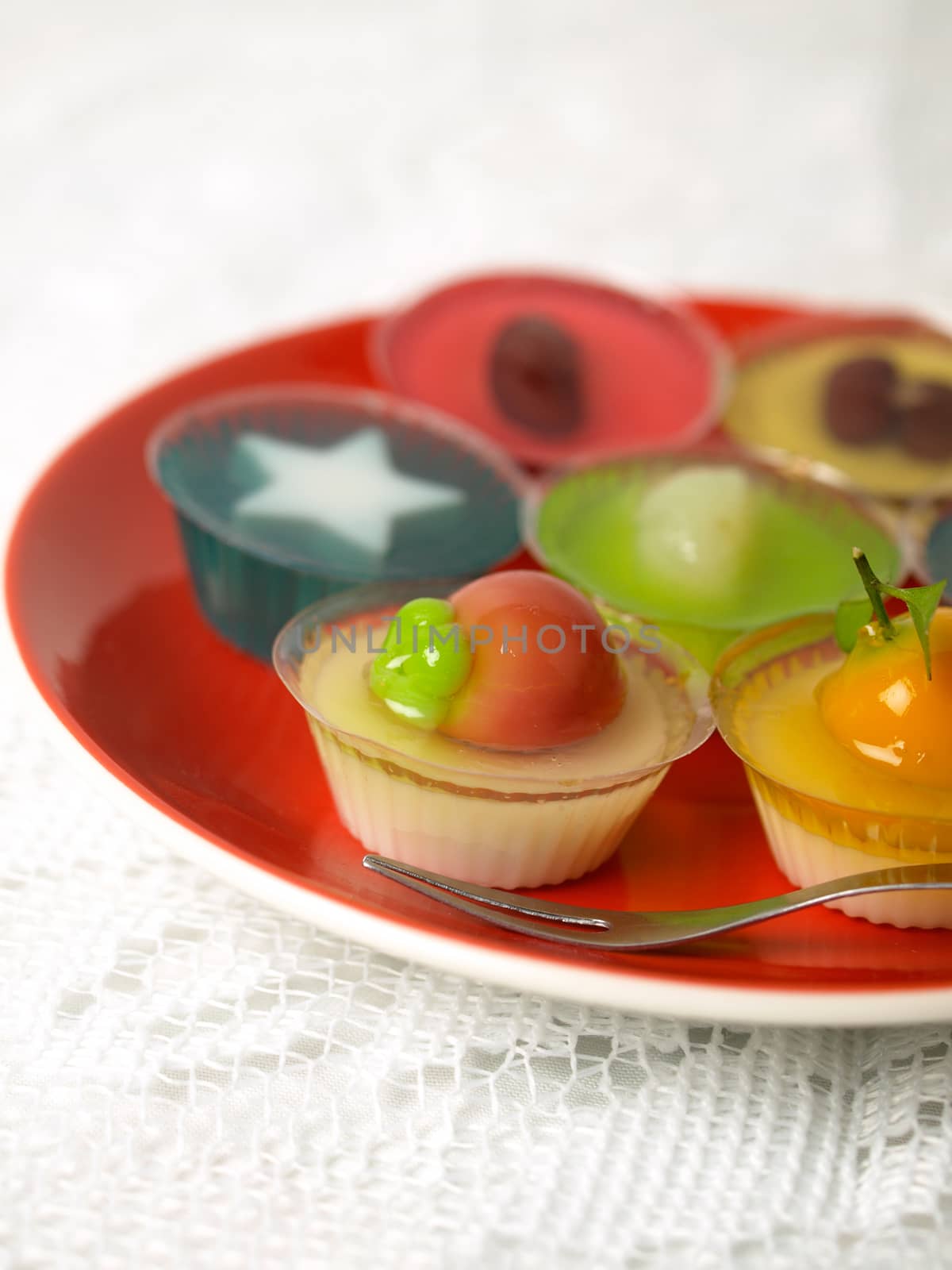 Colorful Coconut jelly Thai dessert with Look Choup , the dessert plated balls