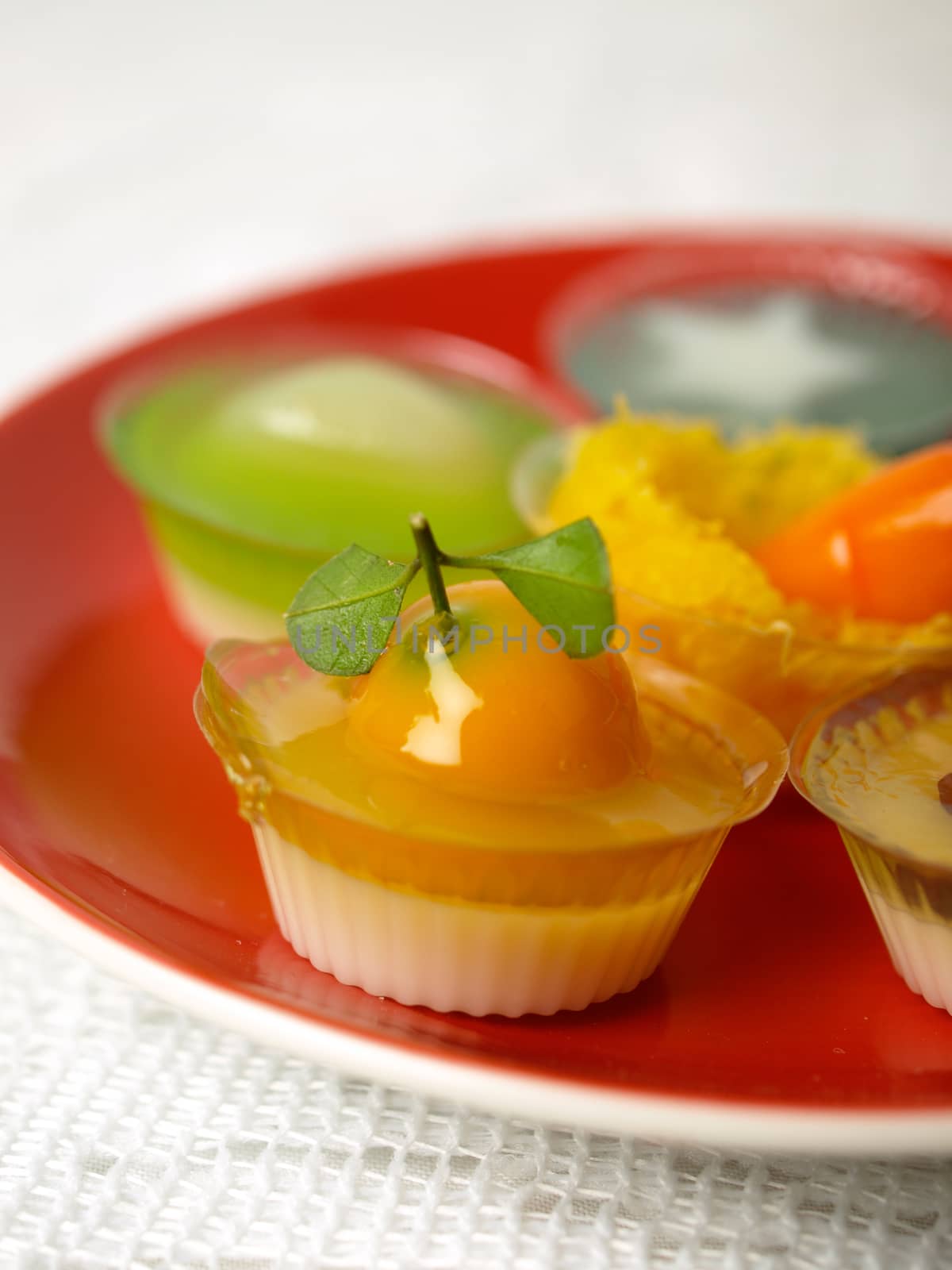 Colorful Coconut jelly Thai dessert with Look Choup , the dessert plated balls