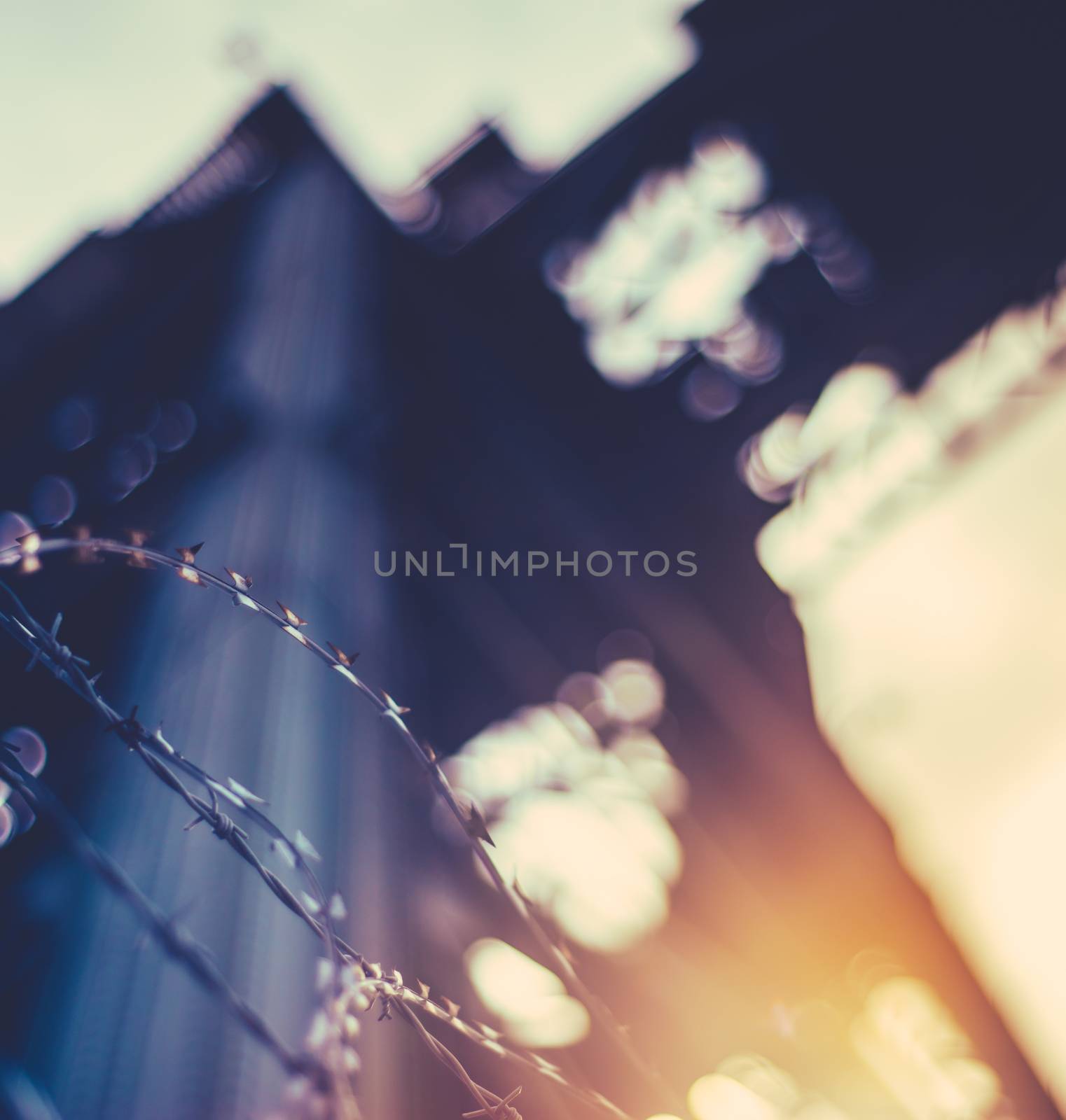 Heavy Industry Abstract Of Barbed Wire In Front Of An Abaondoned Shipbuilding Crane In Glasgow, Scotland