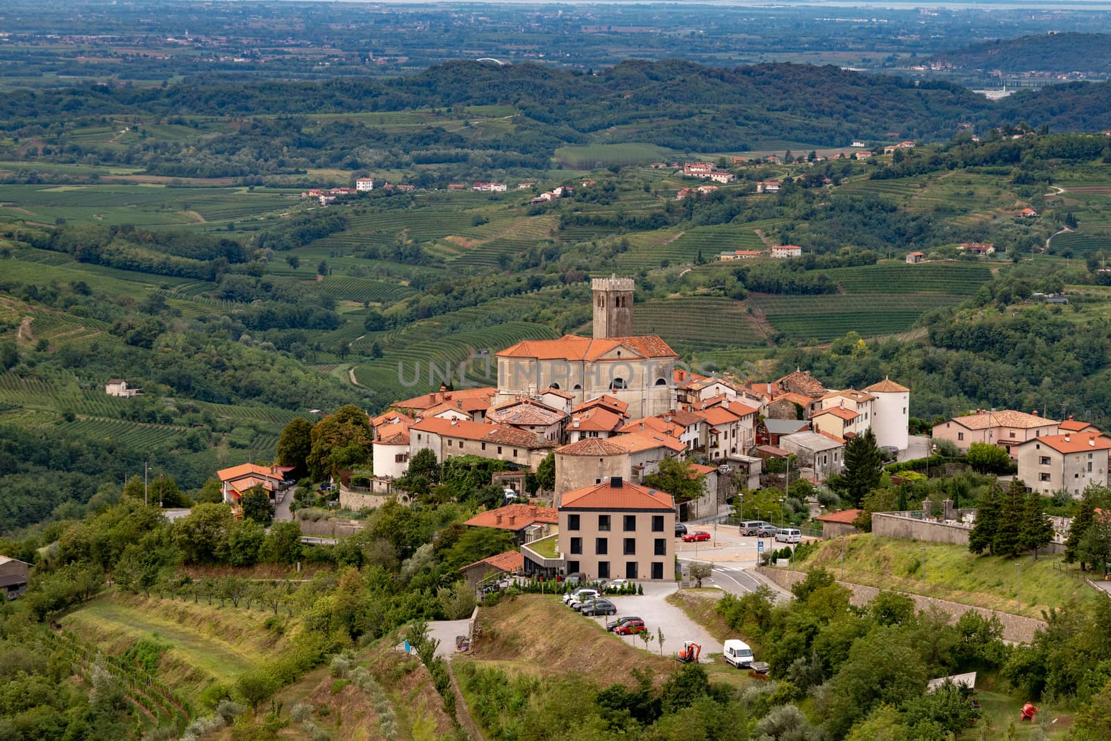 Panoramic view of Smartno in Gorska Brda, Slovenia from above with surrounding vineyards by asafaric