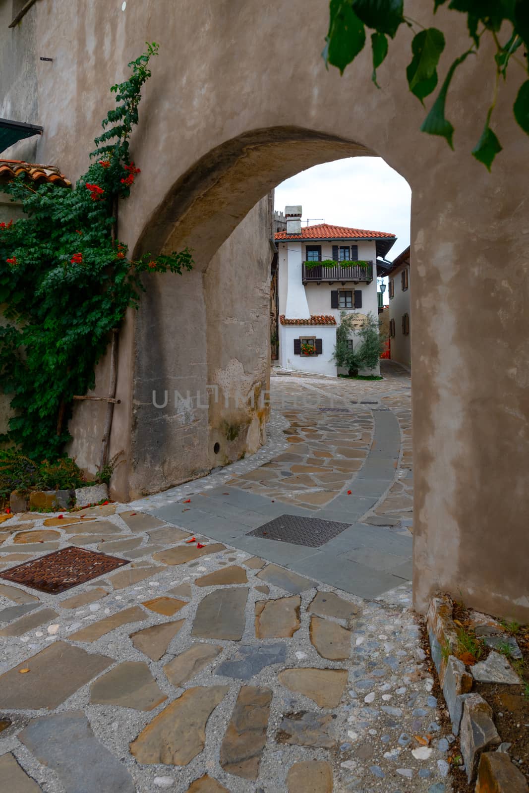 City gates leading into the Main Square in Historic medieval town of Smartno in Goriska Brda, Slovenia with narrov streets leading into the town by asafaric