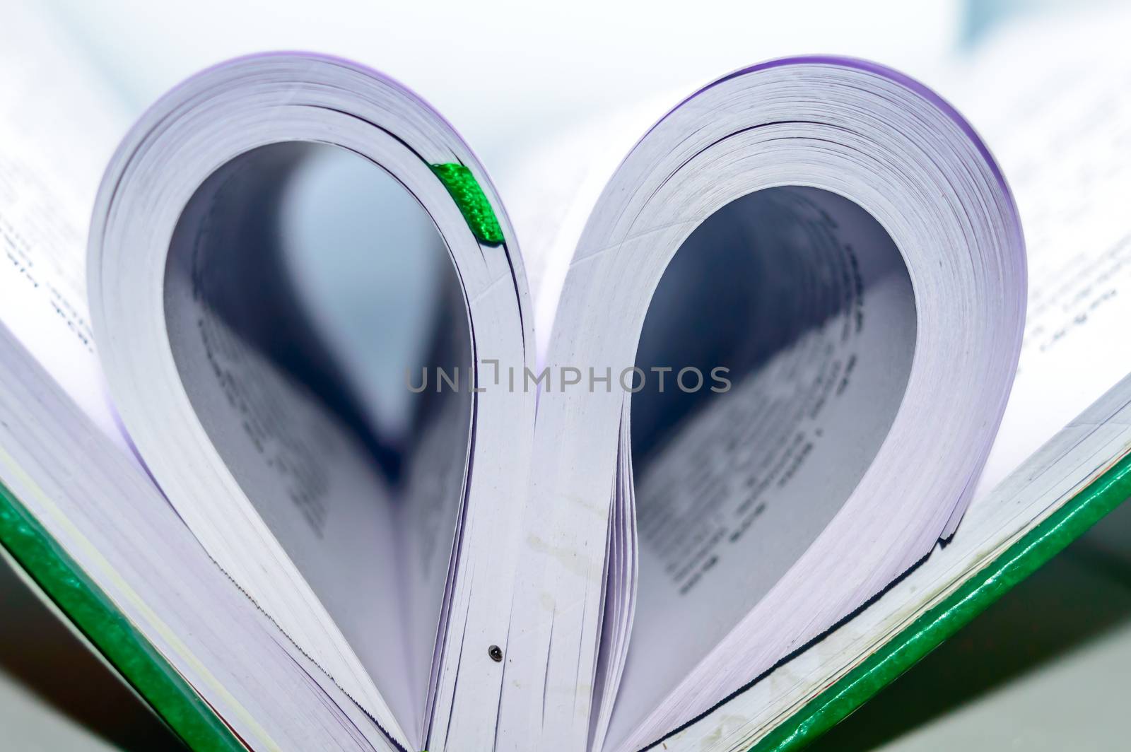 Close up heart shape from paper book by sudiptabhowmick