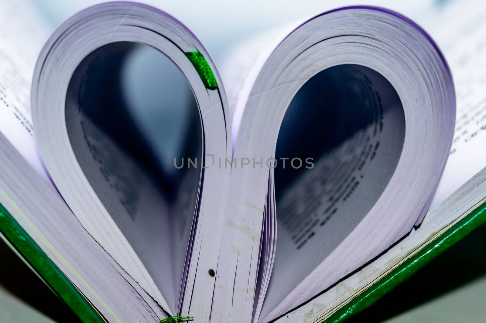 Close up heart shape from paper book by sudiptabhowmick