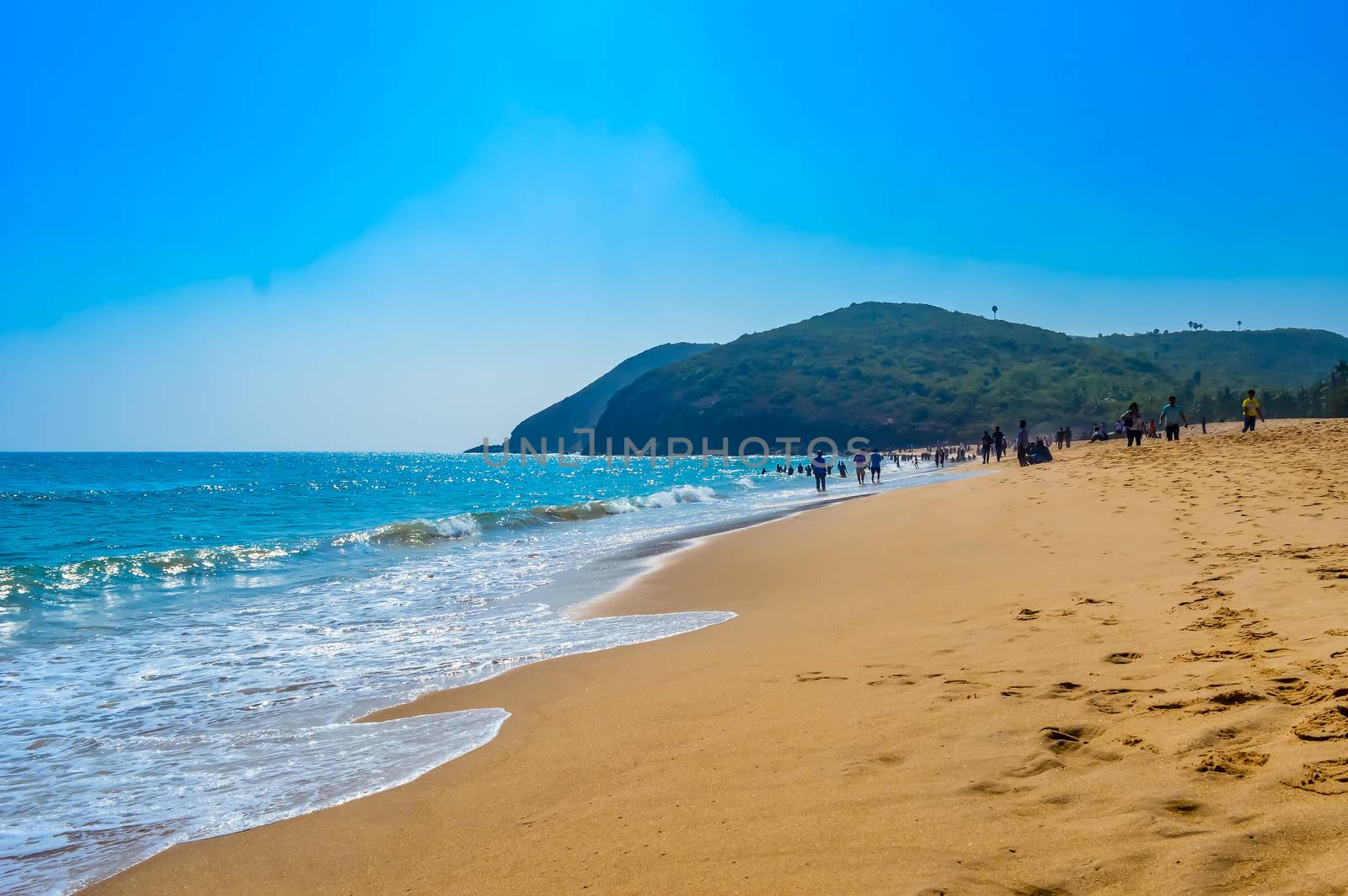 Photograph of Goa Sea Beach taken in Christmas Holiday during New Year celebration in landscape style Useful for background screen saver e-cards website banner usage Travel Vacation new year Concept