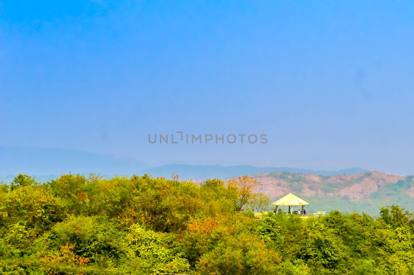 Mountain View taken from top at daytime on sunny day taken in landscape style. Use background wallpaper screen saver e-cards website to decorate interior Nature Travel Vacation Holiday Concept. Subject is inspiration hopeful bright exciting calm gentle beautiful