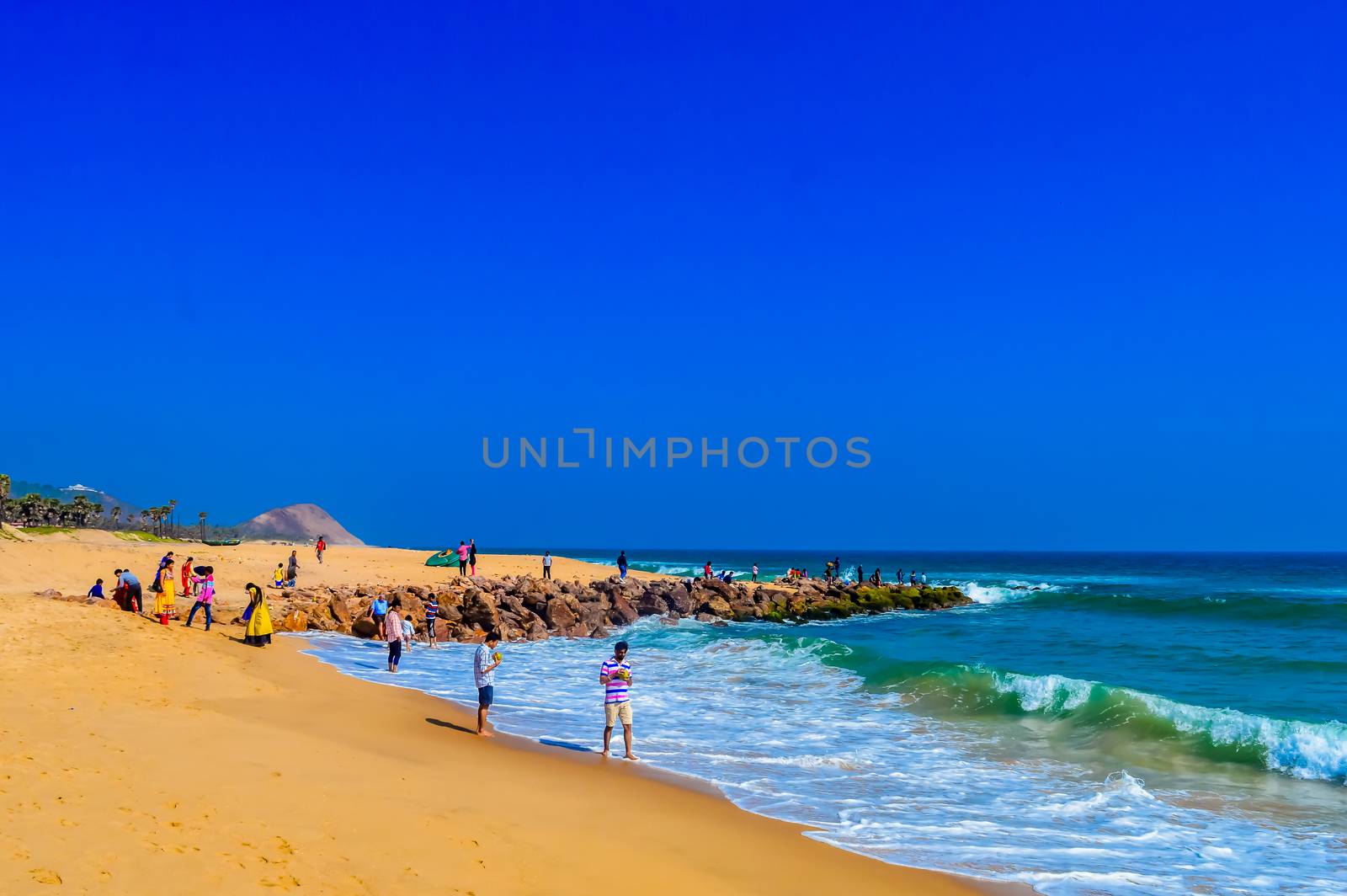 Photograph of Goa Sea Beach taken in Christmas Holiday during New Year celebration in landscape style Use for background screen saver e-cards website banner usage Travel holiday new year celebration