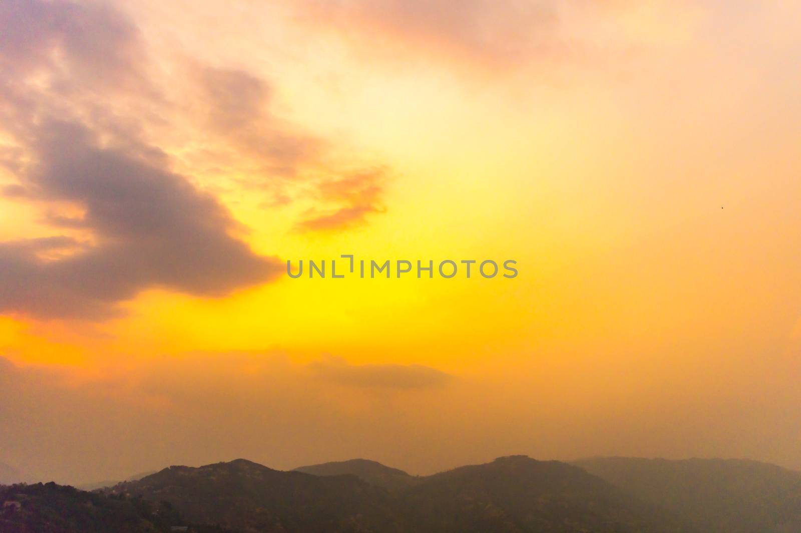 of Vibrant cloudy sky at dusk dawn daytime. Travel, Vacation,Holiday, freedom, simplicity Concept. by sudiptabhowmick