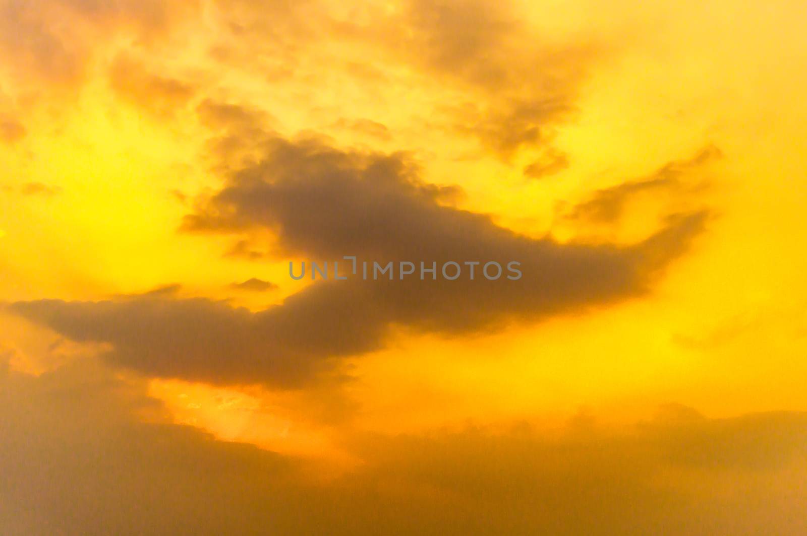 of Vibrant cloudy sky at dusk dawn daytime. Travel, Vacation,Holiday, freedom, simplicity Concept. by sudiptabhowmick