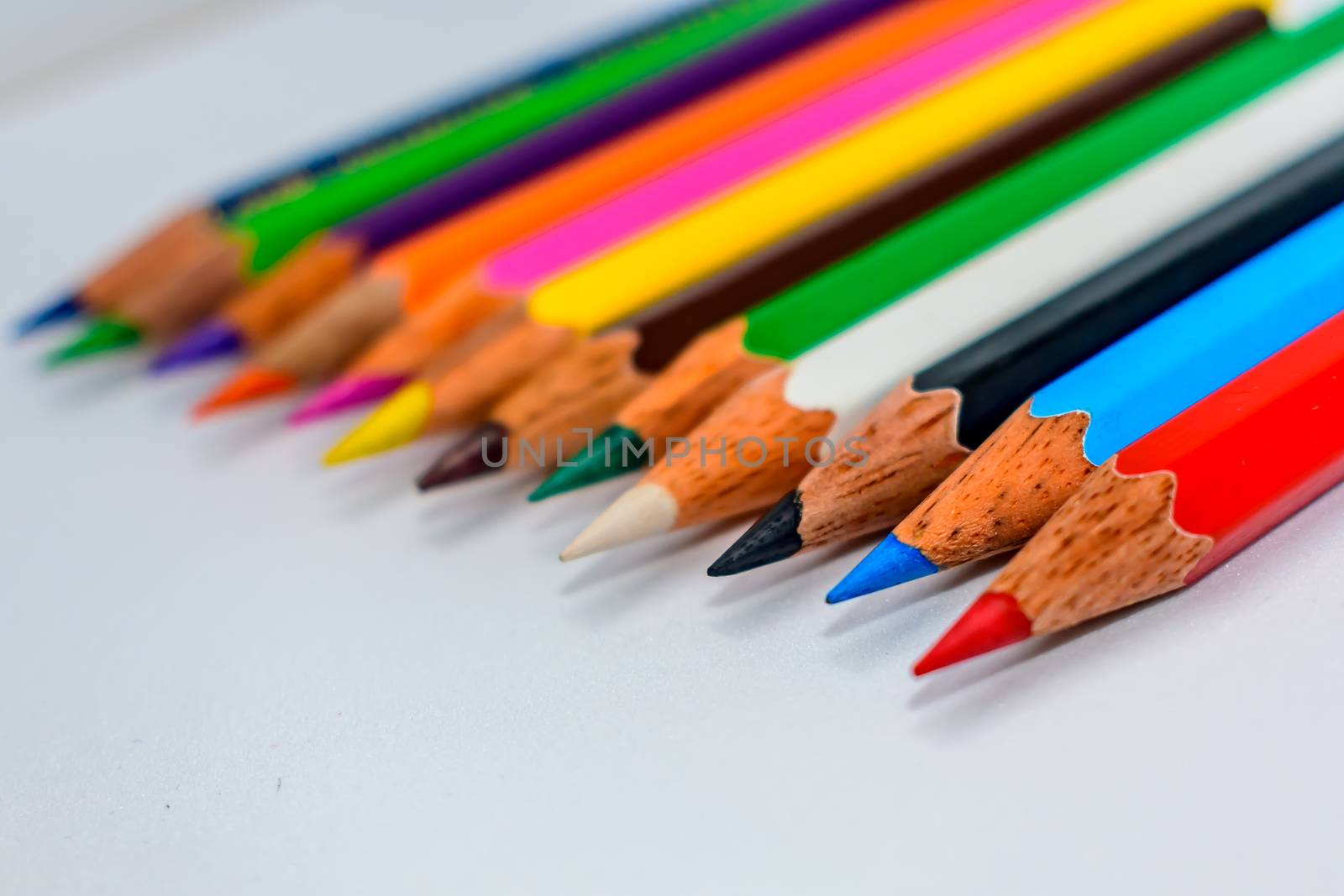 Colored pencil set loosely arranged. by sudiptabhowmick