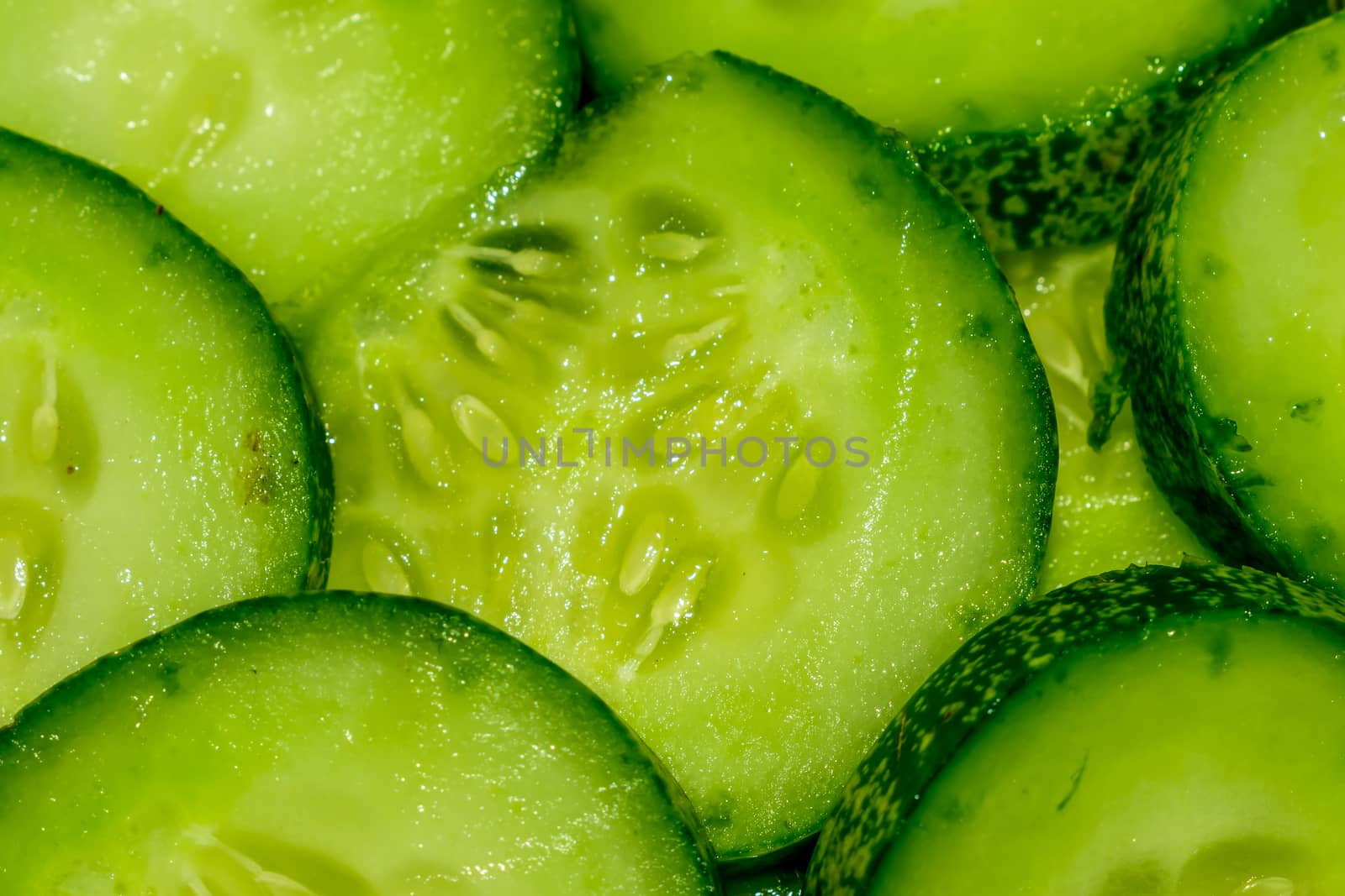Cucumber and sliced background.