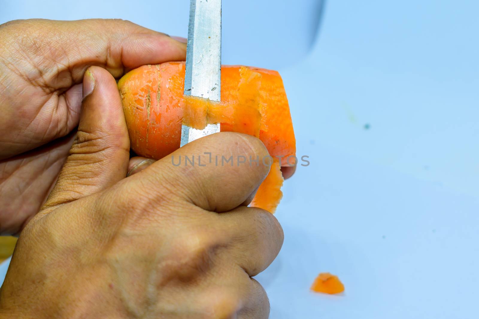 Knife skills: Right or Wrong process of cutting vegetables. The wrong way to hold your fingers when cutting food. Right and wrong ways to hold knife. Chef cutting fresh and delicious vegetables.