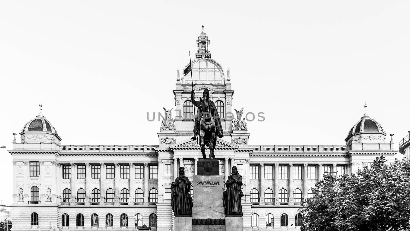 The bronze equestrian statue of St Wenceslas at the Wenceslas Square with historical Neorenaissance building of National Museum in Prague, Czech Republic by pyty