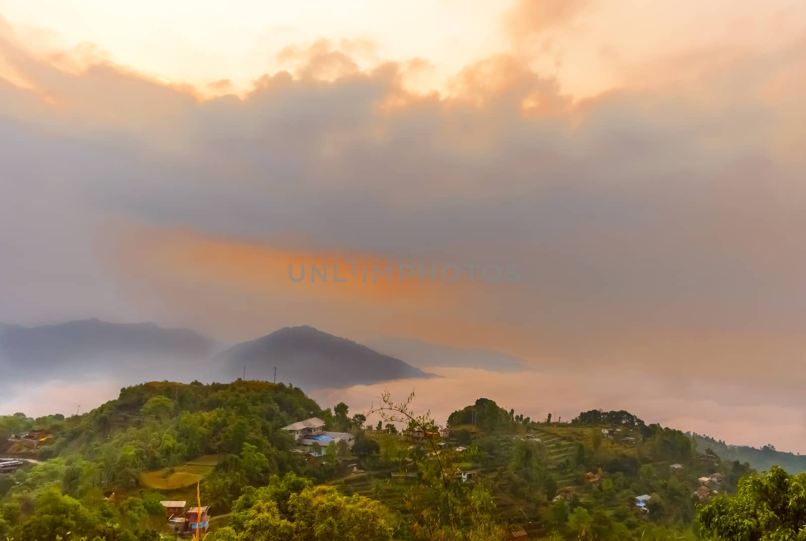 Dark storm clouds before rain.Dark sky with storm clouds. Sarangkot, Pokhara, Nepal by sudiptabhowmick