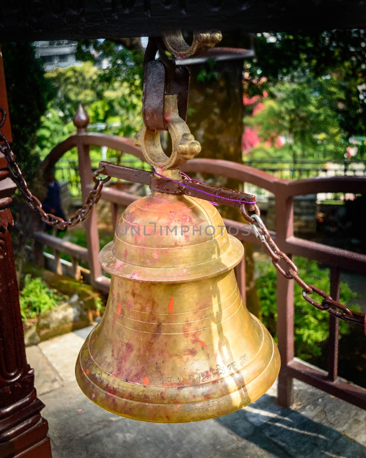 In Hinduism, bells are generally hung at the temple dome in front of the Garbhagriha. Generally, devotees ring the bell while entering into the sanctum. It is said that by ringing the bell, the devotee informs the deity of his/her arrival. The sound of the bell is considered auspicious which welcomes divinity and dispels evil.