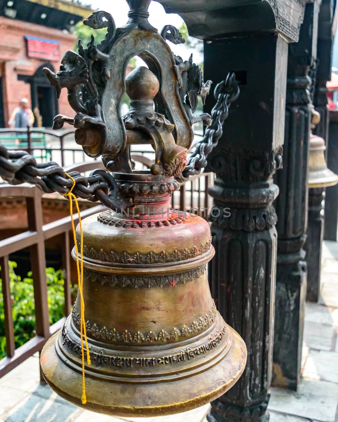 In Hinduism, bells are generally hung at the temple dome in front of the Garbhagriha. Generally, devotees ring the bell while entering into the sanctum. It is said that by ringing the bell, the devotee informs the deity of his/her arrival. The sound of the bell is considered auspicious which welcomes divinity and dispels evil. by sudiptabhowmick