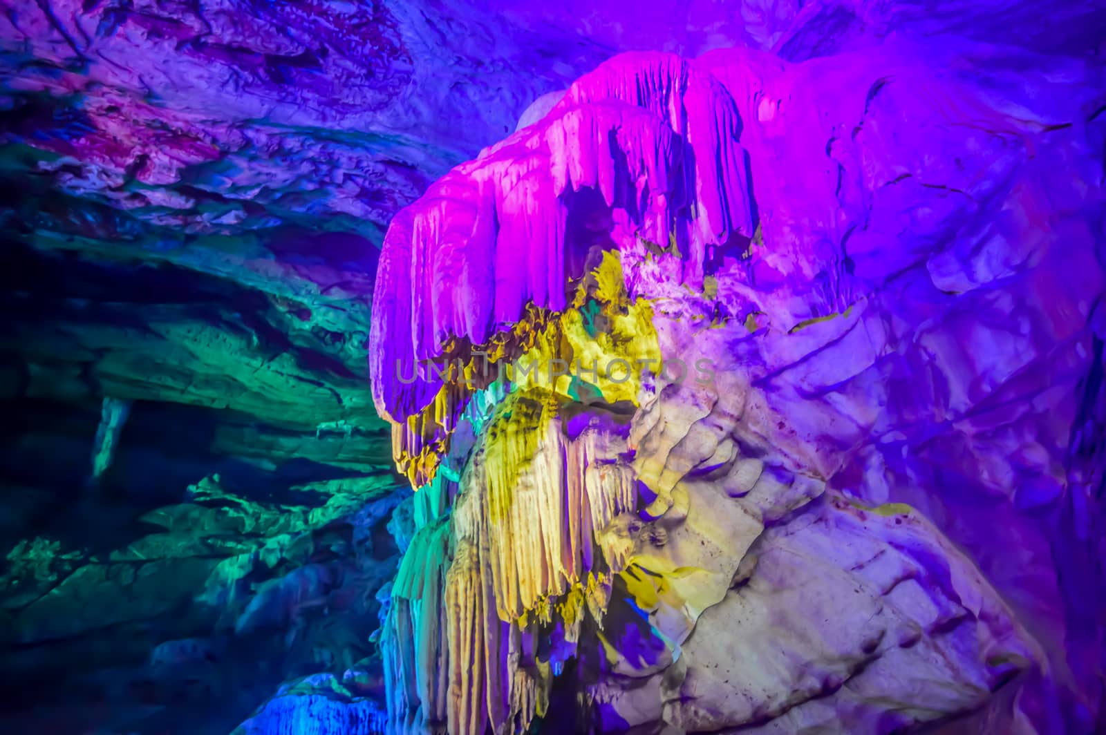 Inside view of Borra Caves formed by solidified stalactites and stalagmites in the karstic limestones formation located in the Araku Valley of the Ananthagiri hill range of the Visakhapatnam district in Andhra Pradesh india captured in dark condition.