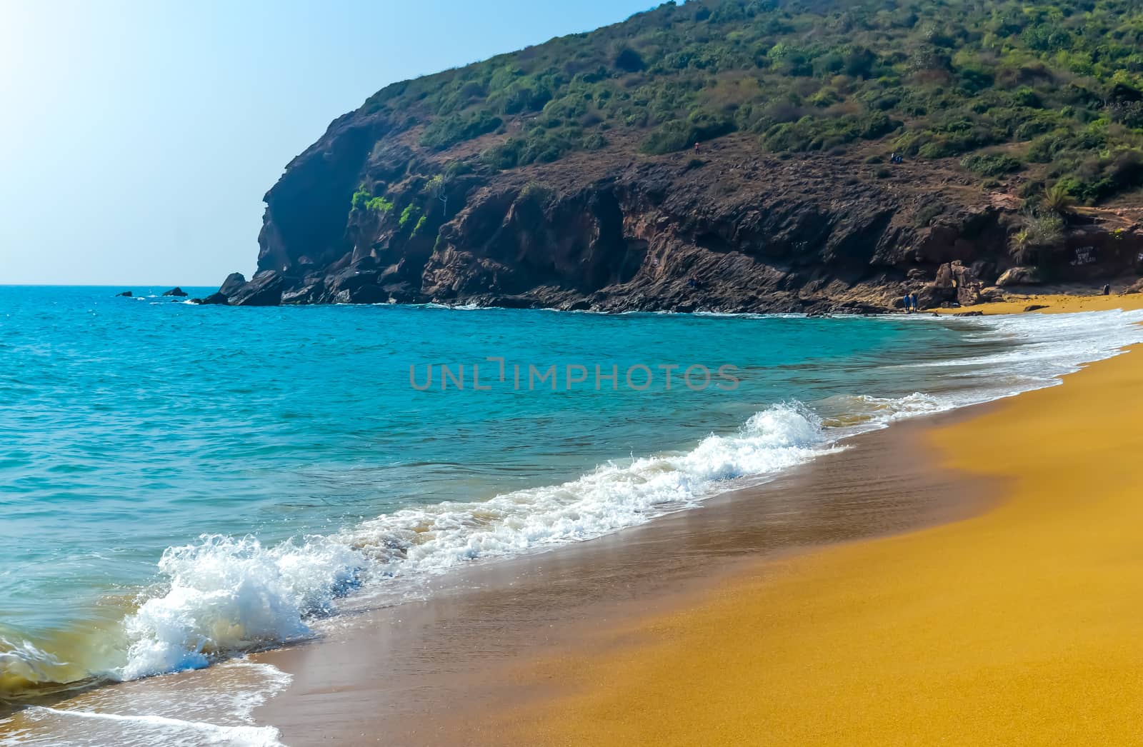 View of Beautiful sea shore with mountain view at sunrise or sunset sunset. by sudiptabhowmick