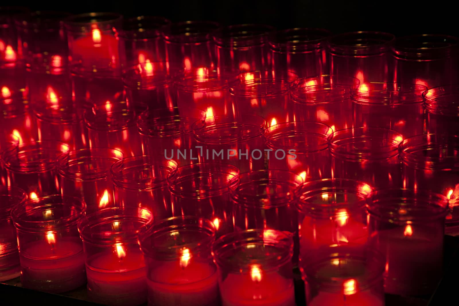 Burning candles in a church, concept of faith