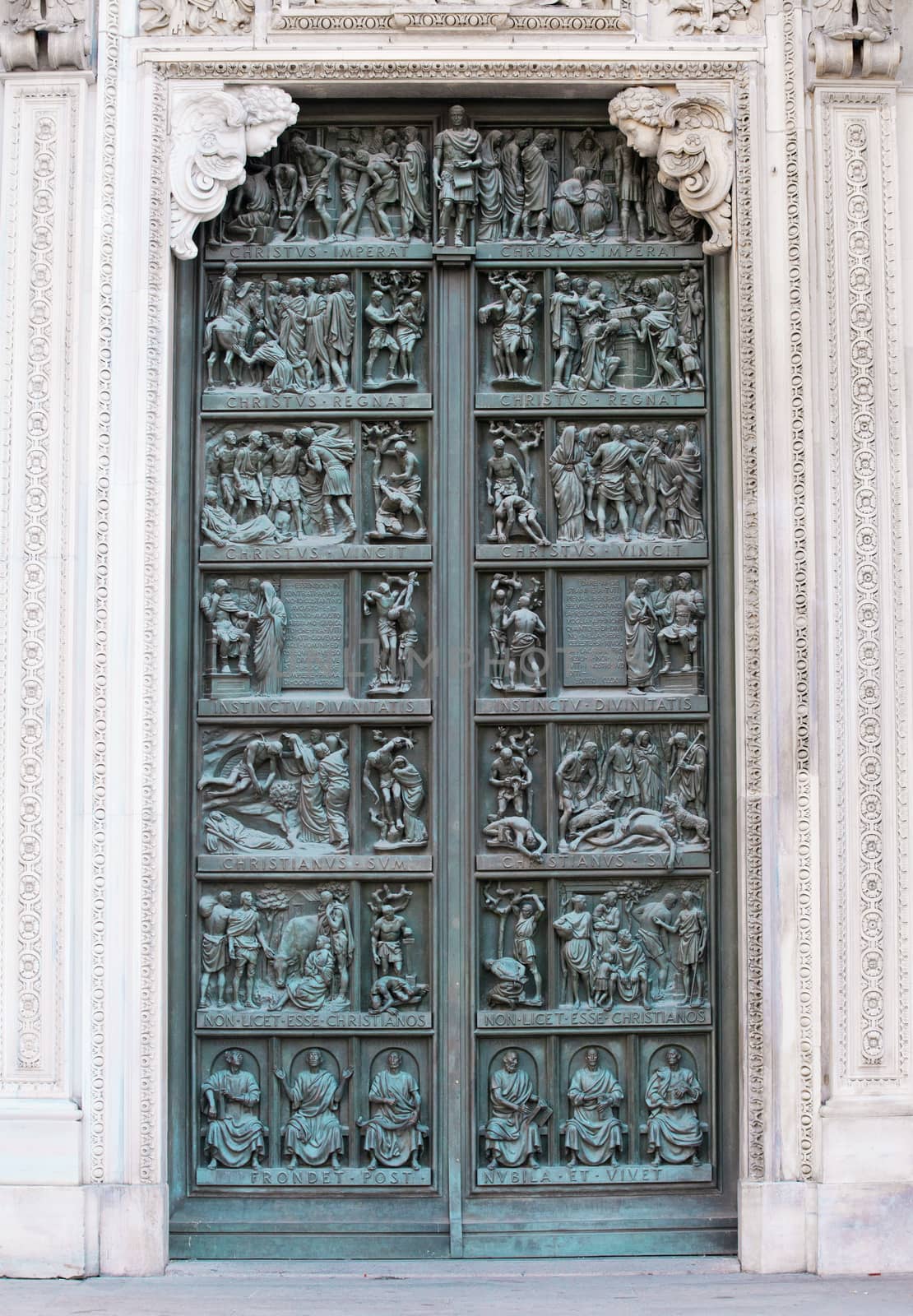 Decorated door of the Milan cathedral, Italy