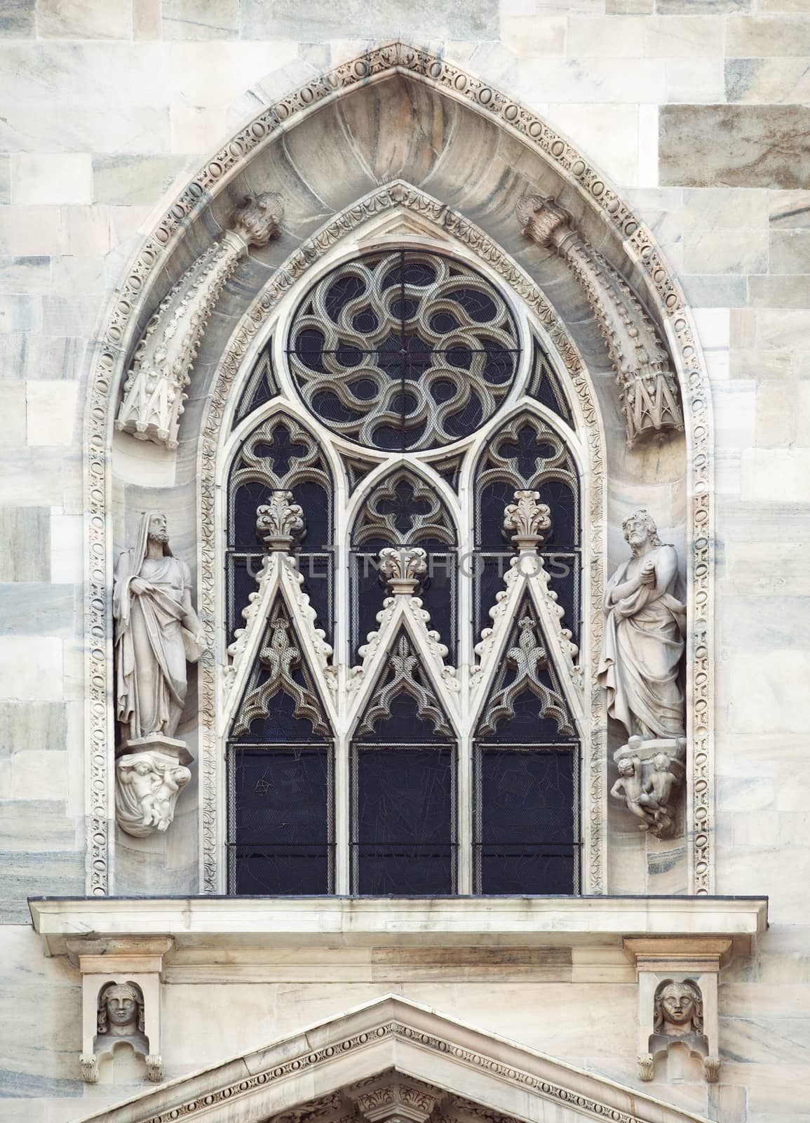 Ornamented window of a cathedral in gothic style