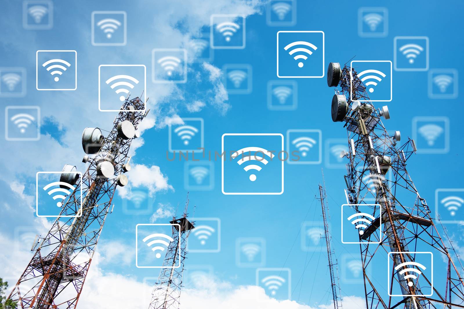 WiFi network on antennas on the top of a hill with blue sky background. Technology and communication 4.0 concept.