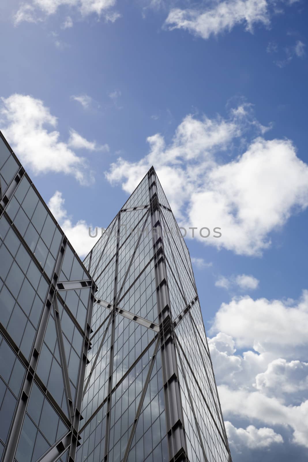 london city centre skyscraper against a blue cloudy sky