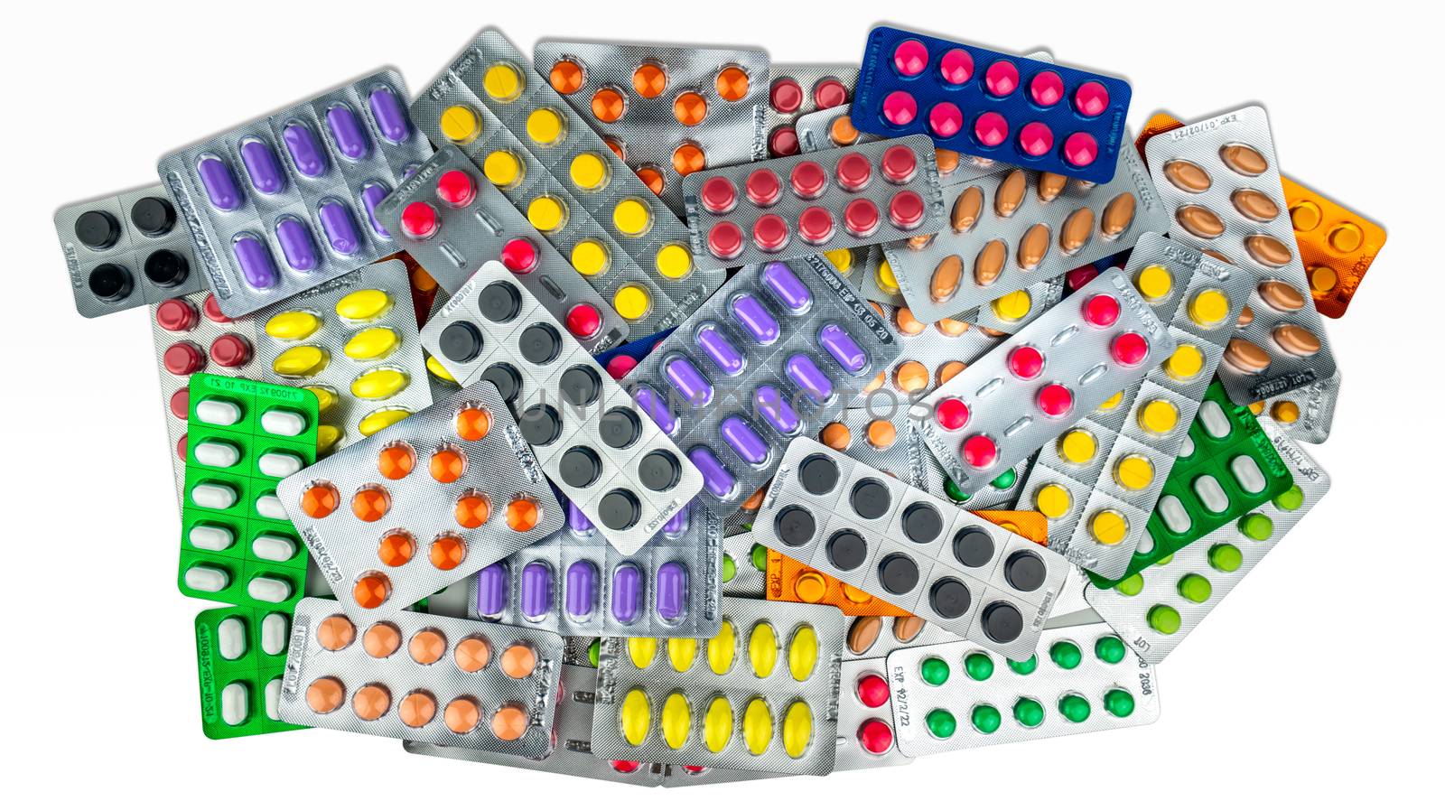 Many of tablet pills isolated on white background. Yellow, purple, black, orange, pink , green tablet pills in blister pack. Painkiller medicine. Drug for migraine headache. Pharmaceutical industry.