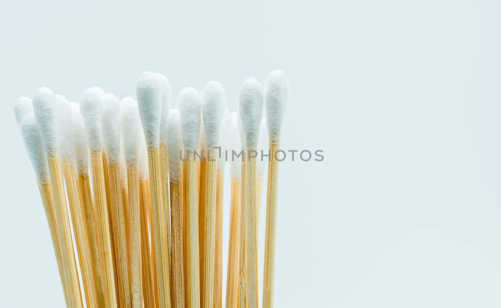 Cotton sticks isolated on white background with copy space for text. Medical equipment. Wound care supply.