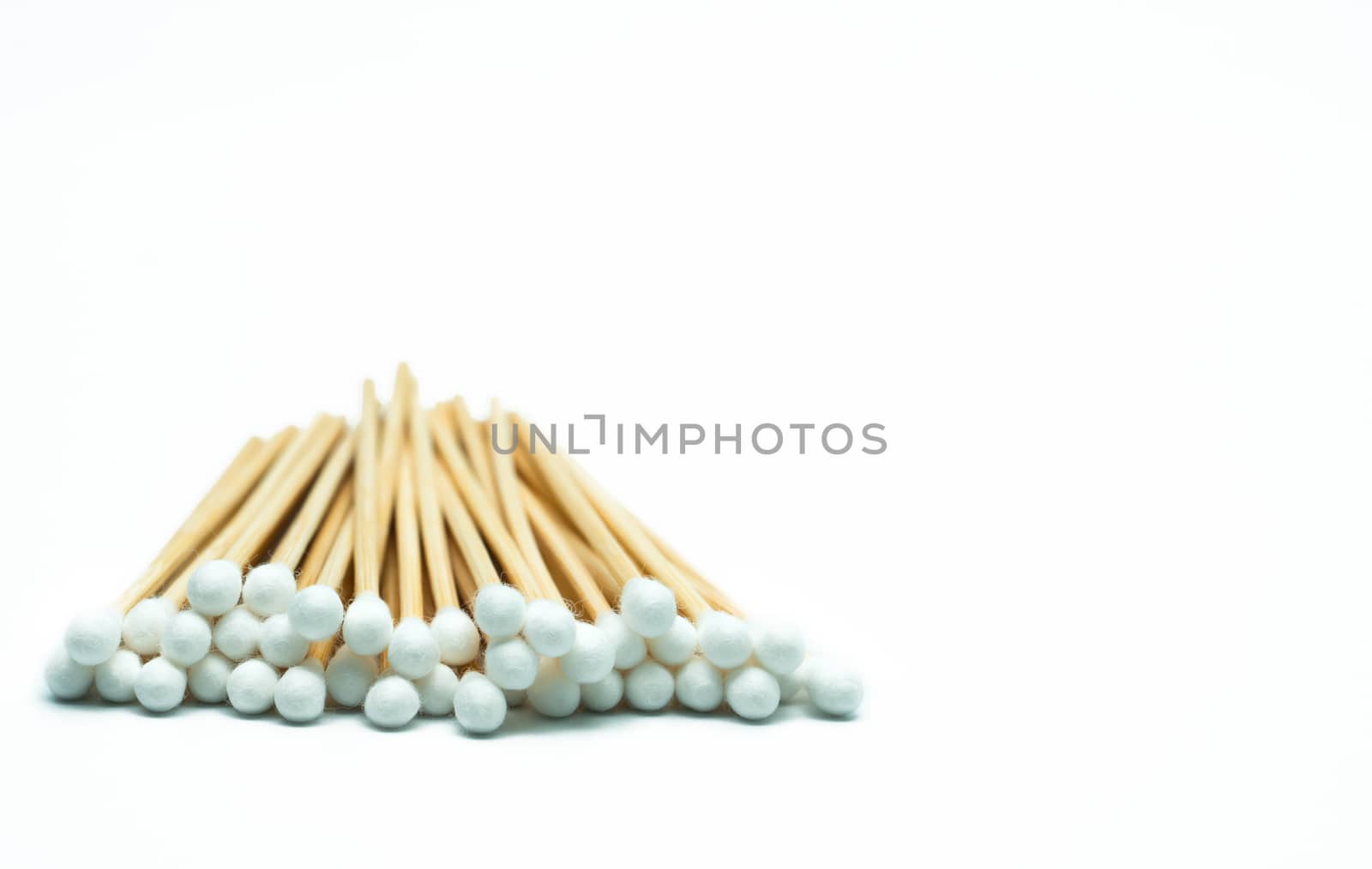Cotton sticks isolated on white background with copy space. Medical equipment. Wound care supply. by Fahroni
