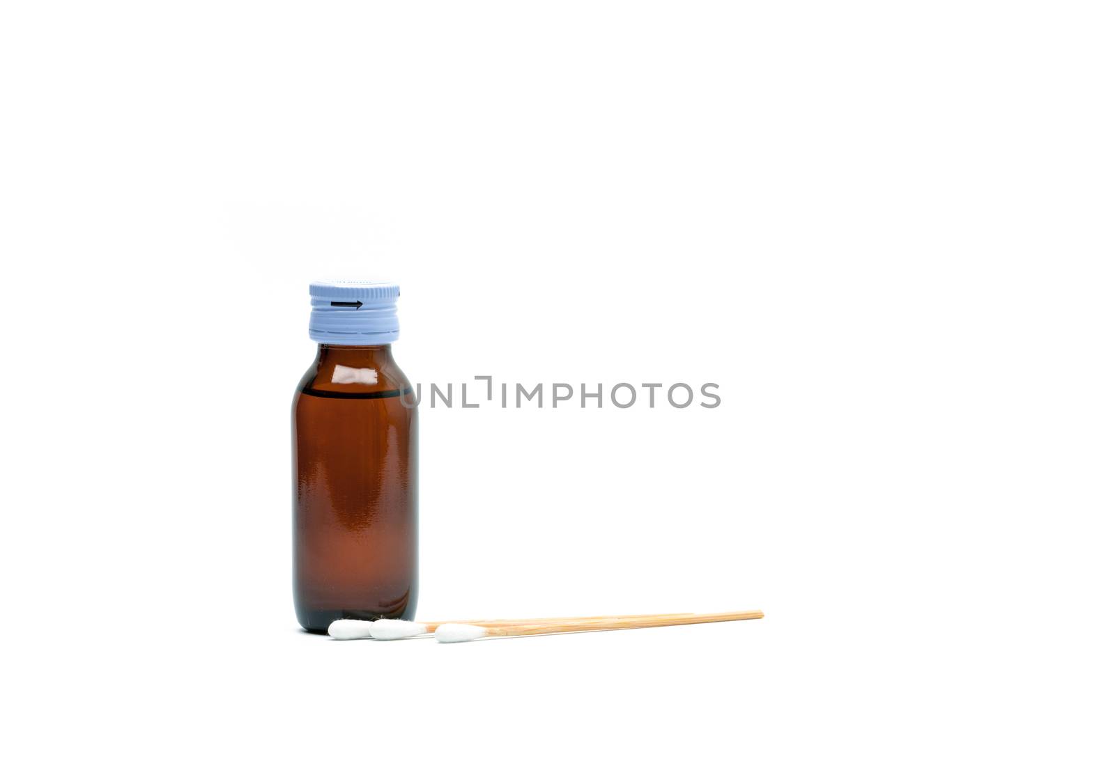 Cotton sticks and antiseptic solutions in amber glass bottle isolated on white background. Concept of Umbilical cord care for helps prevent infection. Infant's umbilical cord cleaning care equipment.