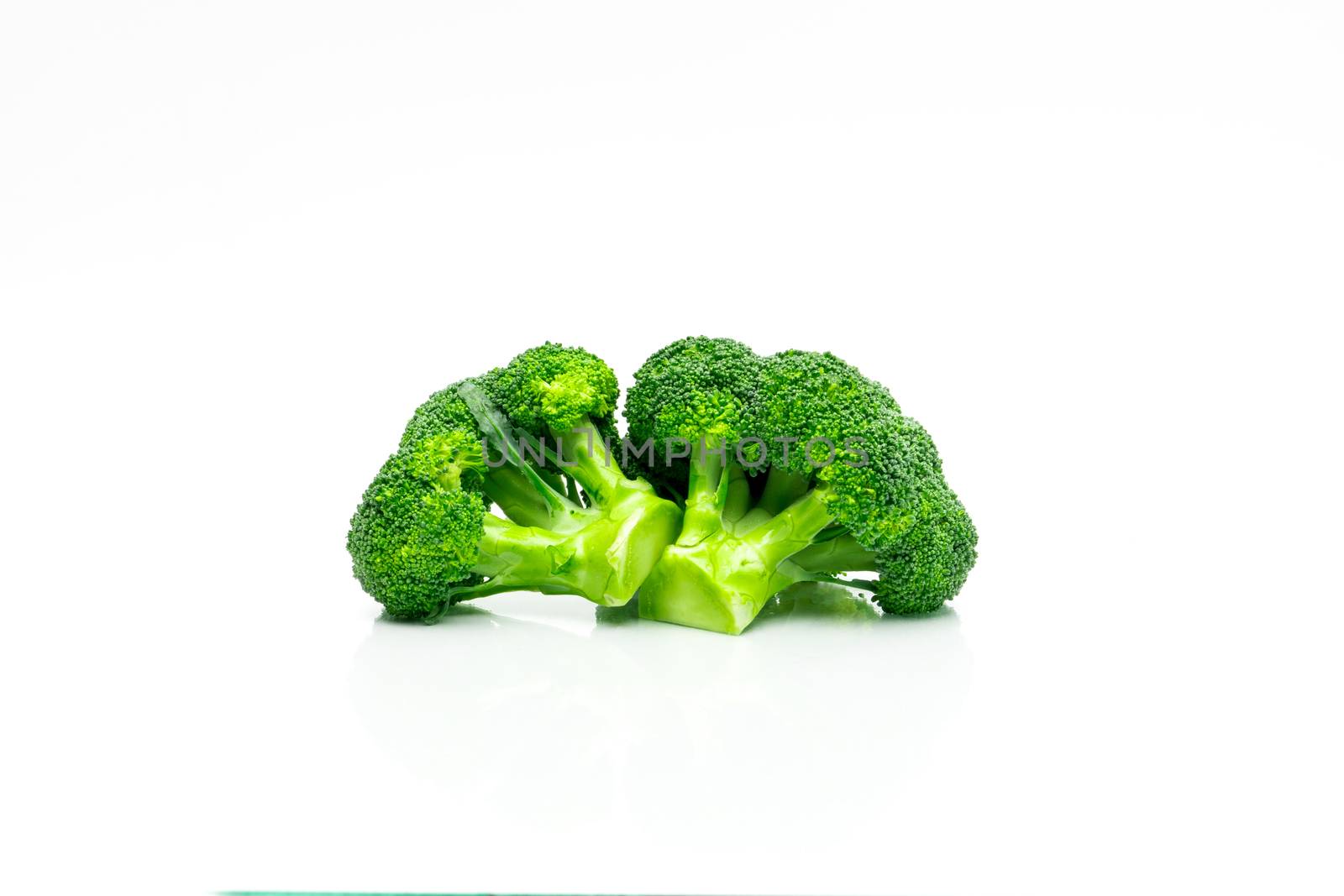 Green broccoli (Brassica oleracea). Vegetables natural source of betacarotene, vitamin c, vitamin k, fiber food, folate. Fresh broccoli cabbage isolated on white background with copy space.