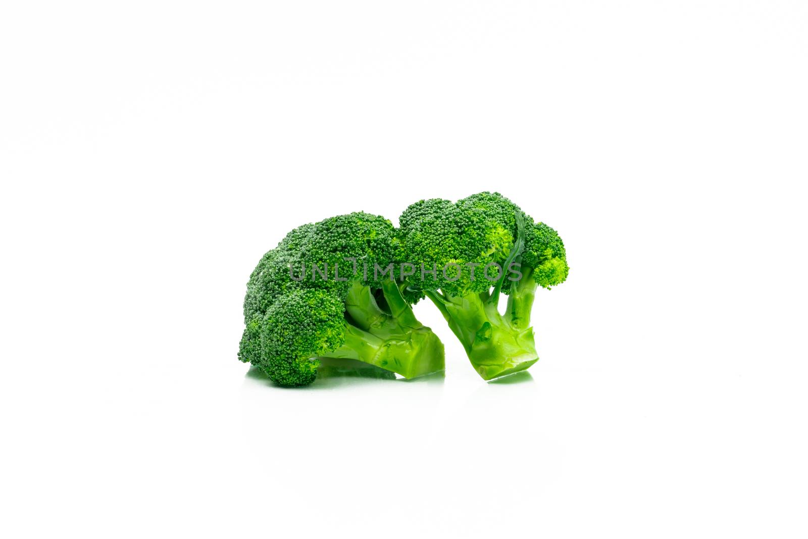 Set of green broccoli (Brassica oleracea). Vegetables natural source of betacarotene, vitamin c, vitamin k, fiber food, folate. Fresh broccoli cabbage isolated on white background with copy space. by Fahroni