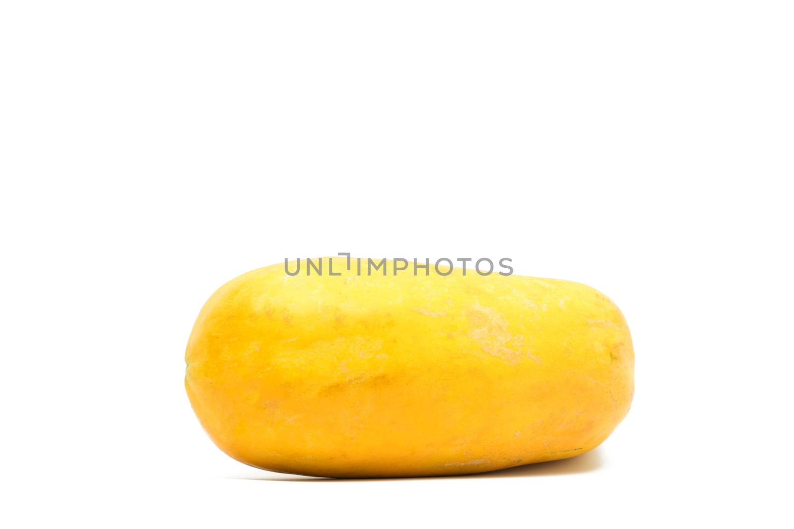Ripe papaya fruit isolated on white background with copy space. Natural source of vitamin C, folate and minerals. Healthy food for pregnant and breast feeding woman. Tropical fruits.