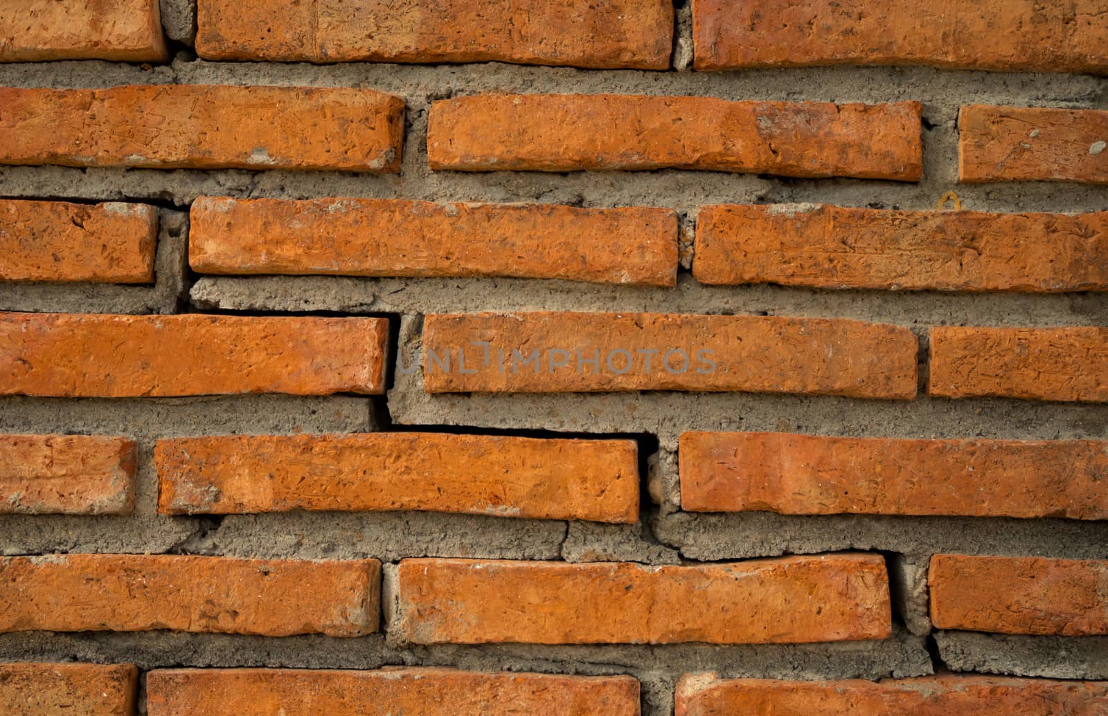 Orange brick wall texture background with copy space for text.