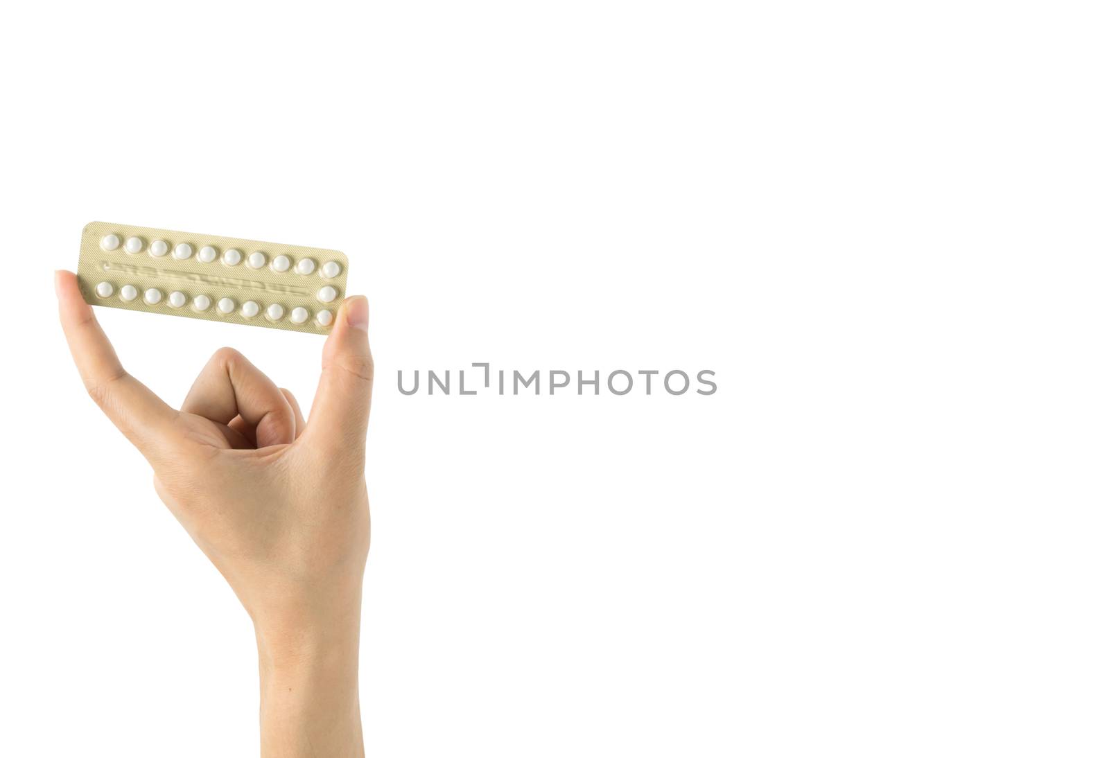 Asian young woman holding pack of contraceptive pills with one hand isolated on white background with copy space and clipping path. Choosing family planning with birth control pill concept by Fahroni