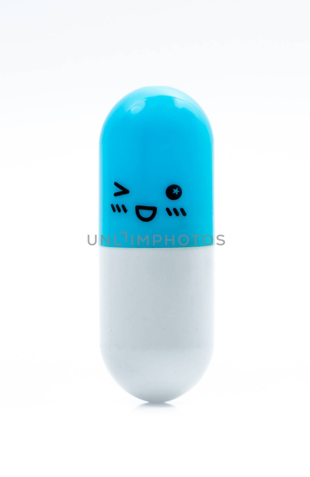 Cute blue and white capsule pill isolated on white background with copy space for text. Global healthcare concept. Healthy and happy life. Pharmaceutical industry. Pharmacy sign and symbol. Pharmacy background. Health budgets and policy. by Fahroni